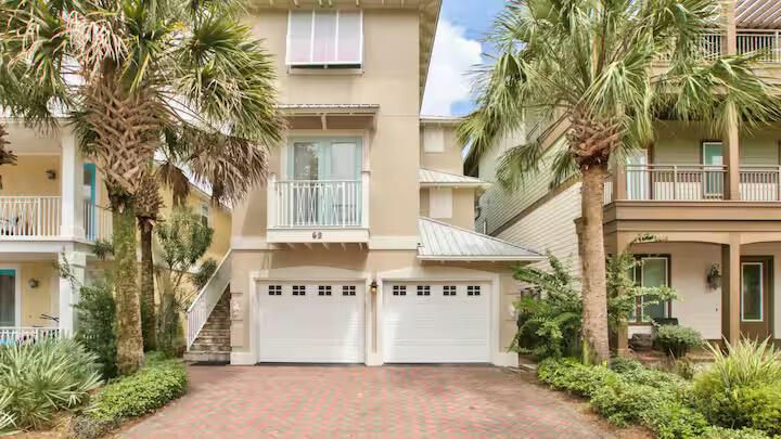 Situated in a prime location, this 4 bedroom, 4 bath home is an idyllic setting for everyday living and entertaining or for a vacation rental/investment property. Located directly ON the expansive 12,000 square foot lagoon pool at Seacrest Beach, this home presents a truly unique opportunity to own within one of the most popular communities along Scenic Highway 30A. Property will convey fully furnished, turnkey, and rental ready. Meticulously maintained as in the last two years the property has had the following: exterior paint , TWO new hot water heaters, and new HVAC! As of July 2025, brand NEW washer and dryer have been installed. Hard surface flooring throughout means ultra-low maintenance while maintaining a good look at the beach. This property has a few other RARE features such as  the finished double GARAGE with refrigerator and lock-out apartment located on the 1st floor. Do not miss the opportunity to purchase this incredible home today!
