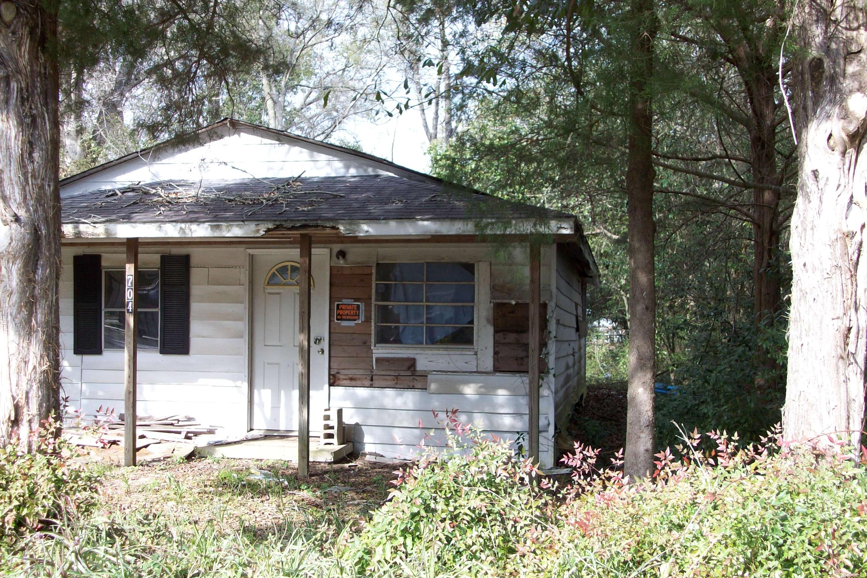 PRICED TO SELL FOR LAND VALUE ONLY!!! No value given to home. Property being sold AS-IS.