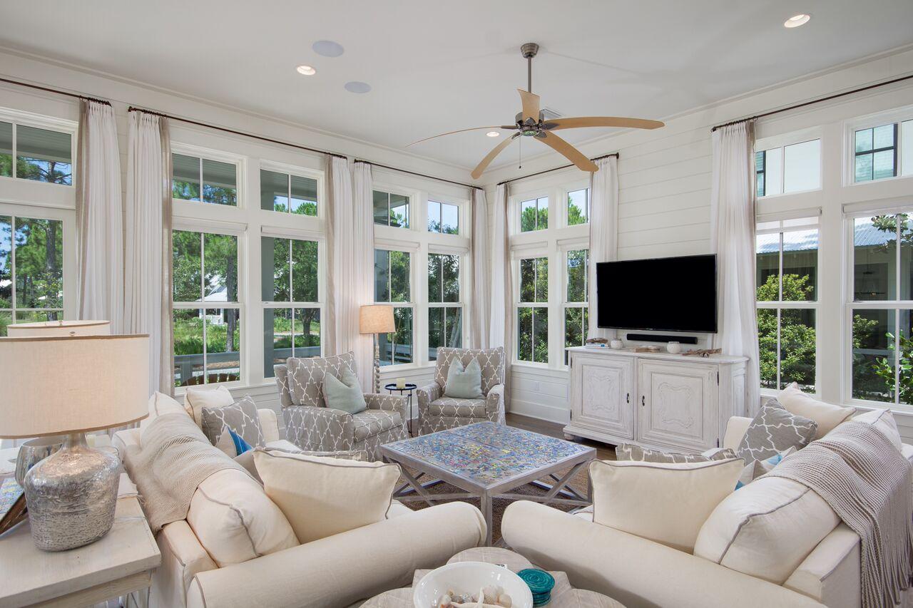 Custom home masterfully built by Romair construction and finished with the highest level of finishes. This elegant and well-designed home exemplifies the best of southern coastal architecture and is well positioned in the popular second phase of WaterColor. Inside, this exquisite home offers 4 large bedrooms (2 master suites), a spacious bunk room with 4 bunks, large living room with high ceilings and exceptional natural light, a dream kitchen with marble counter tops, Wolf/Sub Zero appliance pkg, and an enlarged dining room with ample seating for the entire family. Outside, this home features 3 porches - one which is screened and presents a great outdoor tv area complete with fireplace. Lot is irregular in shape and will accommodate a pool, carriage house & garage. This is a must see home