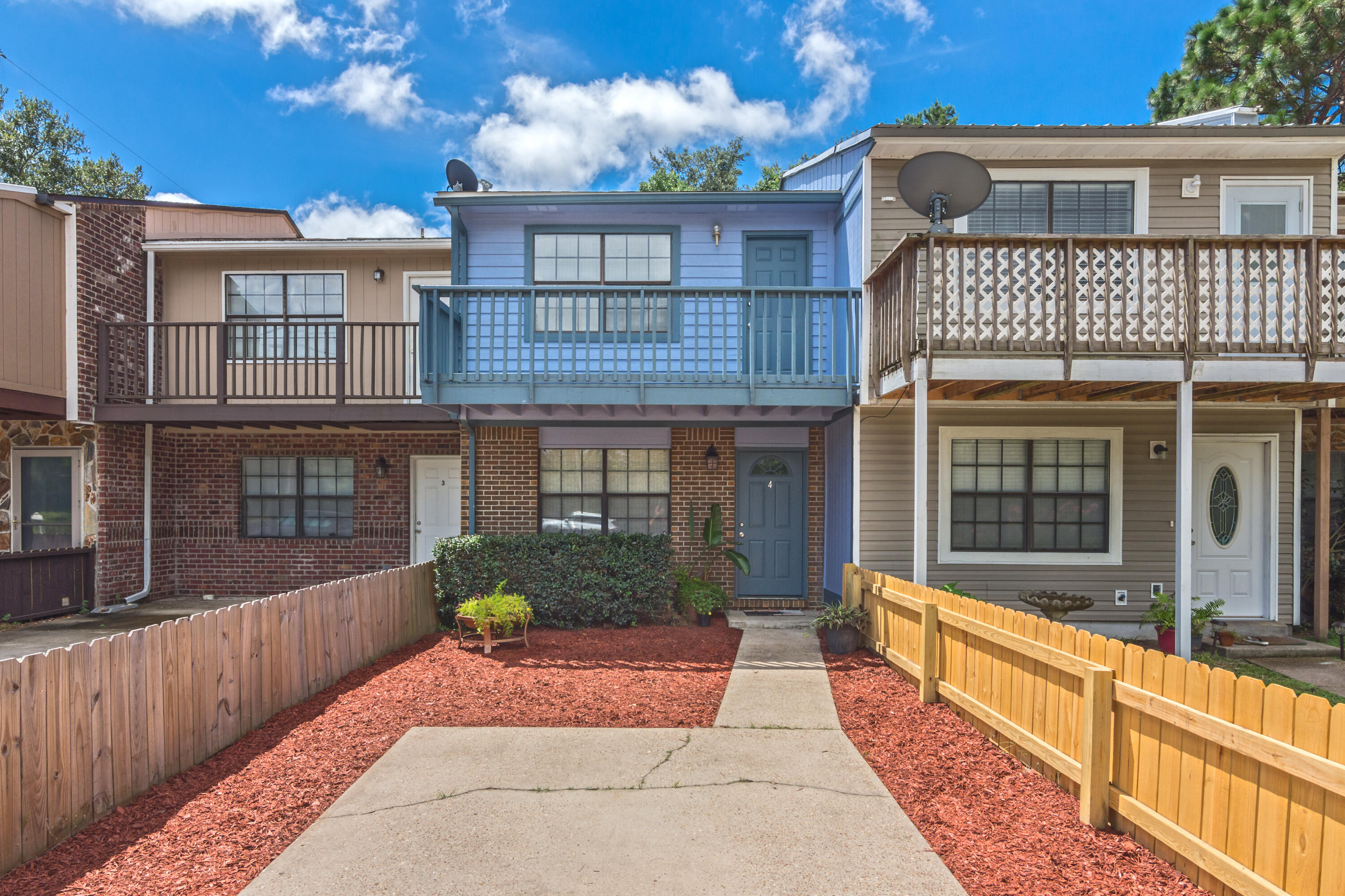 This fully updated two story townhome is located in the central part of Fort Walton Beach, convenient to both bases! New paint and carpet, toilets, shades, landscaping, and privacy fence. Downstairs you will find the  half bathroom, spacious living room with new carpet that leads the the updated kitchen. The sliding glass door leads out to the fenced in back yard. Laundry room located outside with washer/dryer connections. Upstairs there is are 2 bedrooms and 2 bathrooms. Sorry no pets. Credit and background check. Call for showing instructions.