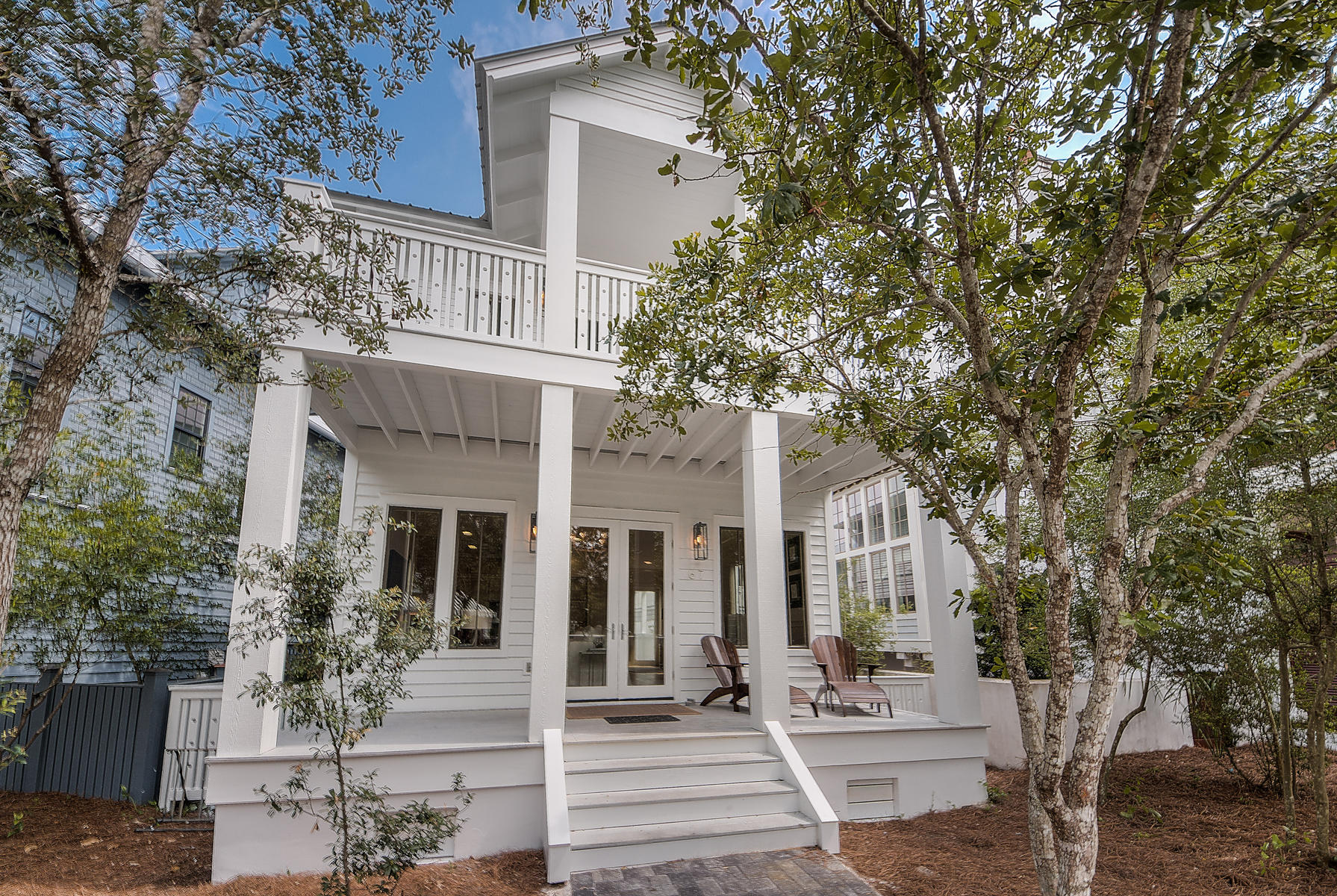 This recently renovated main house and newly constructed carriage house have been locally designed and immediately convey the relaxing vacation atmosphere you've been waiting for. With 5 bedrooms, an additional bunk room, and 5 full baths, this property is located in the perfect spot in Rosemary Beach. From the front porch, one of four community pools is conveniently located across the street. Feel like heading to the beach instead? No problem! Hop on a bike and find yourself at any of Rosemary Beach's nine beach accesses in minutes. Or take a leisurely stroll down one of the many footpaths and absorb the scenery of the unique European design and architecture that this community is known for. The main house is equipped with 3 bedrooms, 3 full baths and an additional bunk room on the second floor. The spacious feel of the main level open floor plan allows the completely renovated kitchen, dining and family room to flow effortlessly onto the shaded front porch. Designed with a chef and family in mind, the kitchen boasts rare, Sea Pearl Quartz countertops and backsplash, stainless appliances and brand new custom cabinetry.  The main level also finds a guest room adorned with light, bright furnishings. The guest suite offers stair-free access on the ground floor, and shares an updated full bath with new Carrera countertops.  Upstairs you will find a lush master suite that is far from ordinary! The painted pinewood ceilings offer a beautiful contrast against the newly stained wood floors. A quaint reading nook, private balcony and an impressive  master bath complete with garden tub and travertine stone throughout make this the perfect place to escape! Down the hall from the master suite are the second guest bedroom complete with en suite bath, an additional bunk room that accommodates four and a contemporary full bathroom. 

Behind the main house is a newly constructed carriage house atop a two-car garage! No detail was overlooked in the design of this generous , 2 bedroom carriage house.  Totaling 484 sq ft, both bedrooms offer ample space for Queen-sized beds and more closet space than one could dream of in a guest house! The elegantly designed bathroom is complete with Carrera countertops, double vanities, marble floors and a walk-in shower. The kitchenette and foyer offer the perfect amount of space to grab a quick bite or your morning coffee before heading to the magnificent , white-sand beaches in Rosemary BeachÂ®. Playgrounds, parks, tennis, a fitness center, 4 community pools and a lively town center are all just minutes away at 67 W Water Street!