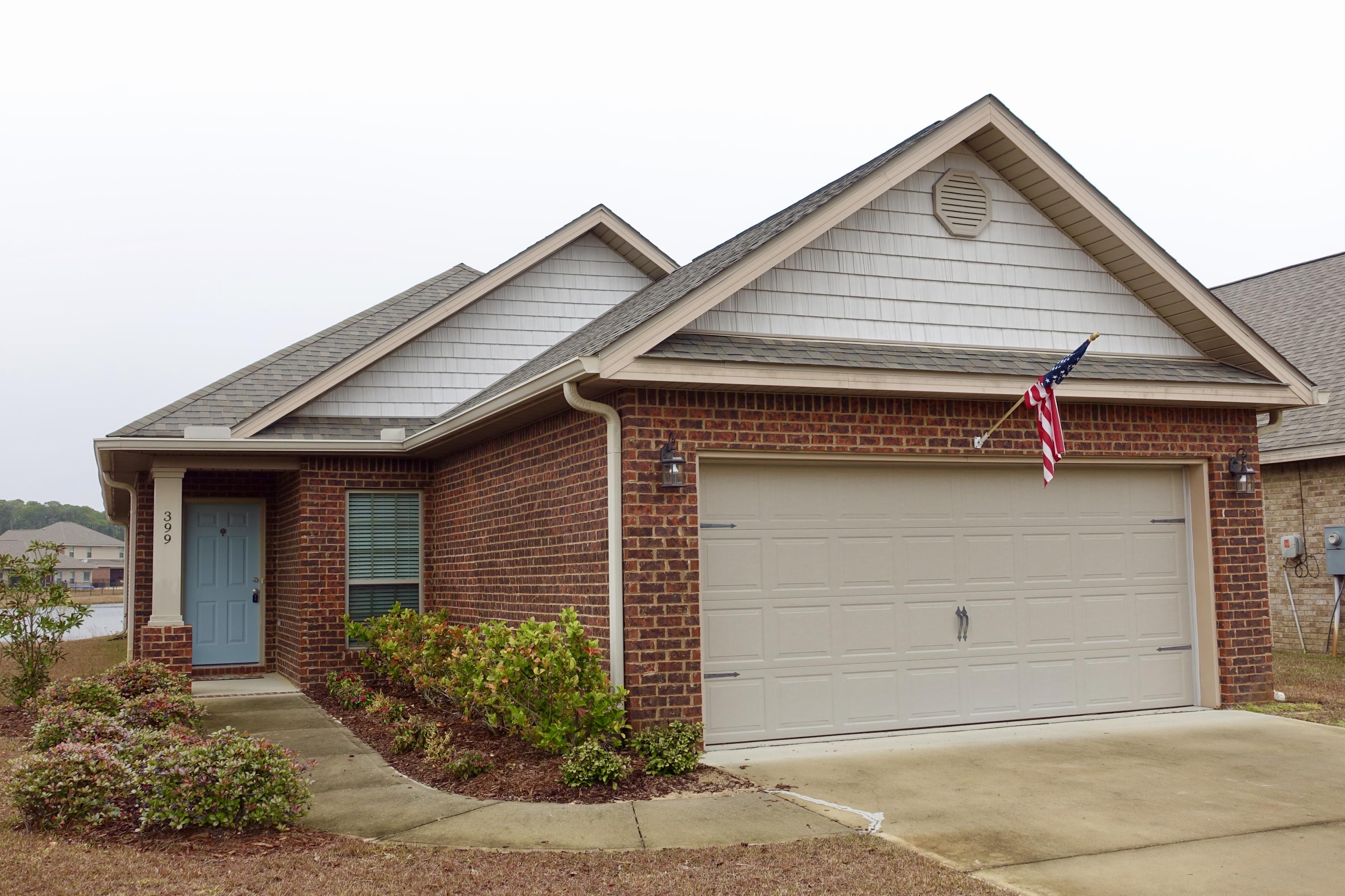 Waterfront, 1 Story, 3 Bedroom, 2 Bath, 2014 Brick Home with Vaulted Ceilings & Open Floor Plan. Enjoy the Covered Patio & large back yard overlooking the Lake. Eat in Kitchen offers Lake Views & has Granite Countertops, Breakfast Bar, Double Sink, Refrigerator, Stove/Oven, Microwave, Pantry & Tile Floors. Spacious Master Suite has large walk in closet & Master Bath with Dual Vanities, Garden Tub, Separate Shower. Master Bedroom also offers Lake Views. 2 Guest Bedrooms share a Full Hall Bath. Laundry Room has Washer & Dryer. 2 Car Garage. Close to Community Pool and Playground Area. Driftwood Estates has Sidewalks and Catch & Release Lakes. A great friendly Community. Close to Sacred Heart Hospital & Medical Offices, Grand Blvd Restaurants, Shops, Theatre & Publix Grocery & 30-A Beaches.