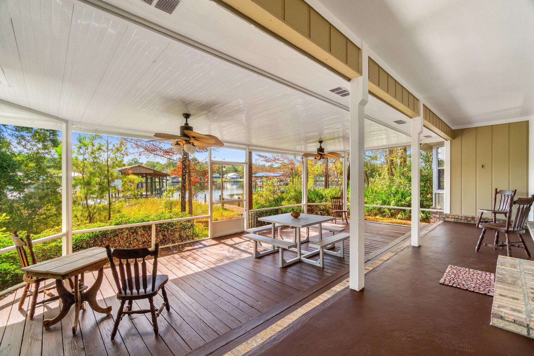 Included with this water front paradise is a 6 TON BOAT LIFT!  It is easy to show and includes a dock. Approximately 5 years ago the owner sold his boat after the boat lift was installed therefore the boat lift was only used a few times. There is ample privacy from the front of the home. The entire backside of the home provides a beautiful waterfront view. The large screened back porch aIlows room for relaxation, dining and entertaining. The interior of the home provides an open concept.  There is an attached covered grilling porch off the kitchen. The home also includes an oversized garage.    It is the responsibility of the buyer to verify all measurements, if important.