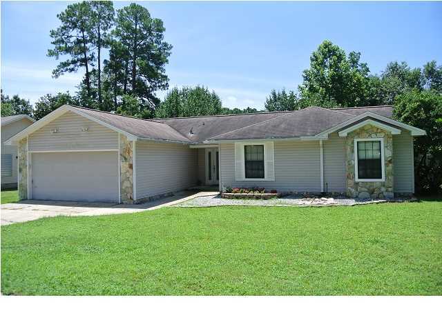 AVAILABLE JULY 14, 2017!!! Pool home at the end of a quiet street in the heart of Niceville. Featuring tile throughout the main living areas and living areas and dark laminate flooring in the bedrooms. The open concept layout offers an over sized living room with fireplace, nice sized kitchen and a dining room over looking the back yard oasis. The back yard is an entertainers delight with an enormous deck leading to a large salt water pool. It doesn't end there though, the spacious back yard is lined by a privacy fence and offers a large storage building. The home also offers ample parking with a circular driveway and additional parking pad for a boat or RV. Pool service is included with the rent. Sorry, no indoor smoking. Pets may be allowed with a $400 non-refundable pet fee.