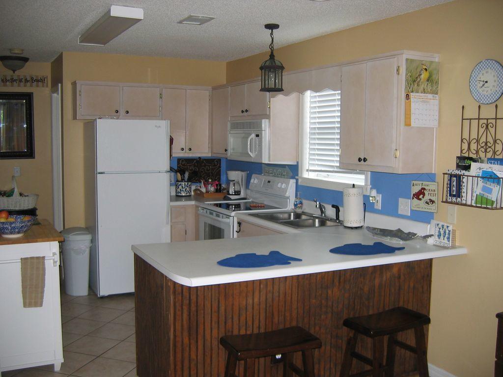 This is a quintessential first floor chic beach residence located SOUTH of 30-A and just a shell's throw to the beach! Unit 1014 has the LARGER 2 bedroom plus 2 bath floor plan and offers sleeping arrangements for up to 5 people. A wide, white sand beach, plus the best dining, spas, golf, shopping, and entertainment is at your fingertips and can all be taken advantage of from this centrally located condo. Imagine your days walking, biking, sunning, and splashing at this affordable beach retreat. Situated on the most coveted stretch of South Walton beach, this condo conveys fully furnished with new furnishings and TV's plus a seasoned rental history.Beachside Villas has two sparkling pools, tennis courts and shuffleboard plus easy beach access in a tucked away location in Seagrove Beach with 2 coastal dune lakes offerinkayaking, paddle boarding and eco-sploring. The Washer /Dryer and AC unit are both less than three years old.