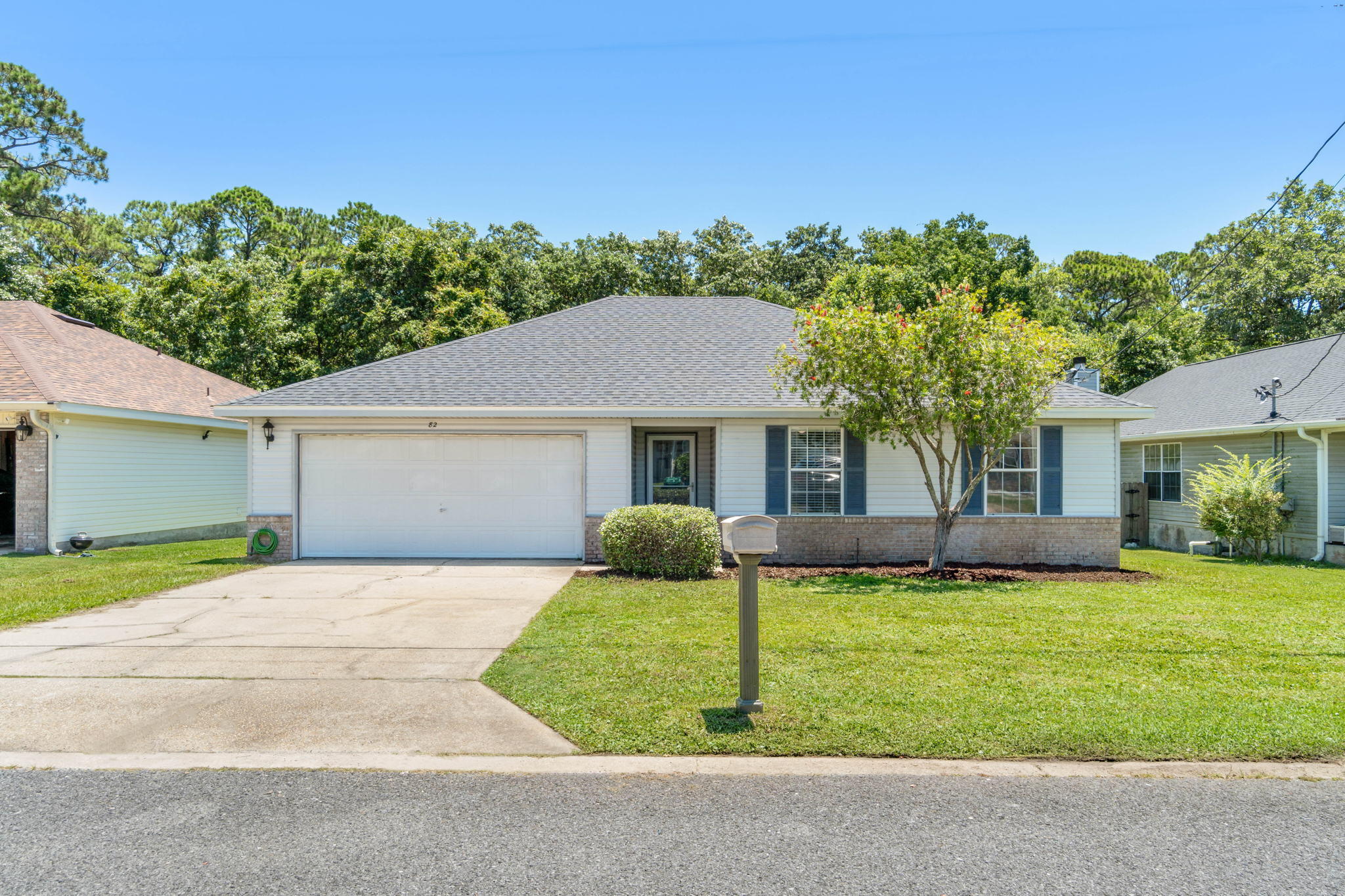 Conveniently located just 5 minutes to Hurlburt Field and with no HOA this would make a fantastic private residence, second home, or investment property! Don't miss out on this lovely 3 bedroom, 2 bath home updated with a new roof in 2019. Enjoy an open floor plan with hard surface flooring throughout all the common areas and a spacious living room with a vaulted ceiling - all freshly painted! The kitchen space is roomy with an eat in kitchen space, and it leads out the back door where you'll love relaxing and/or entertaining on the large back deck overlooking a private and fenced in backyard. Enjoy a great sized master bedroom with a walk-in closet, and the other two bedrooms are also nice sized with ample closet space. Both bathrooms feature updated and modern vanities you will love and upgraded ceiling fans are throughout. Other notable features are an interior laundry and two car garage. Welcome home!