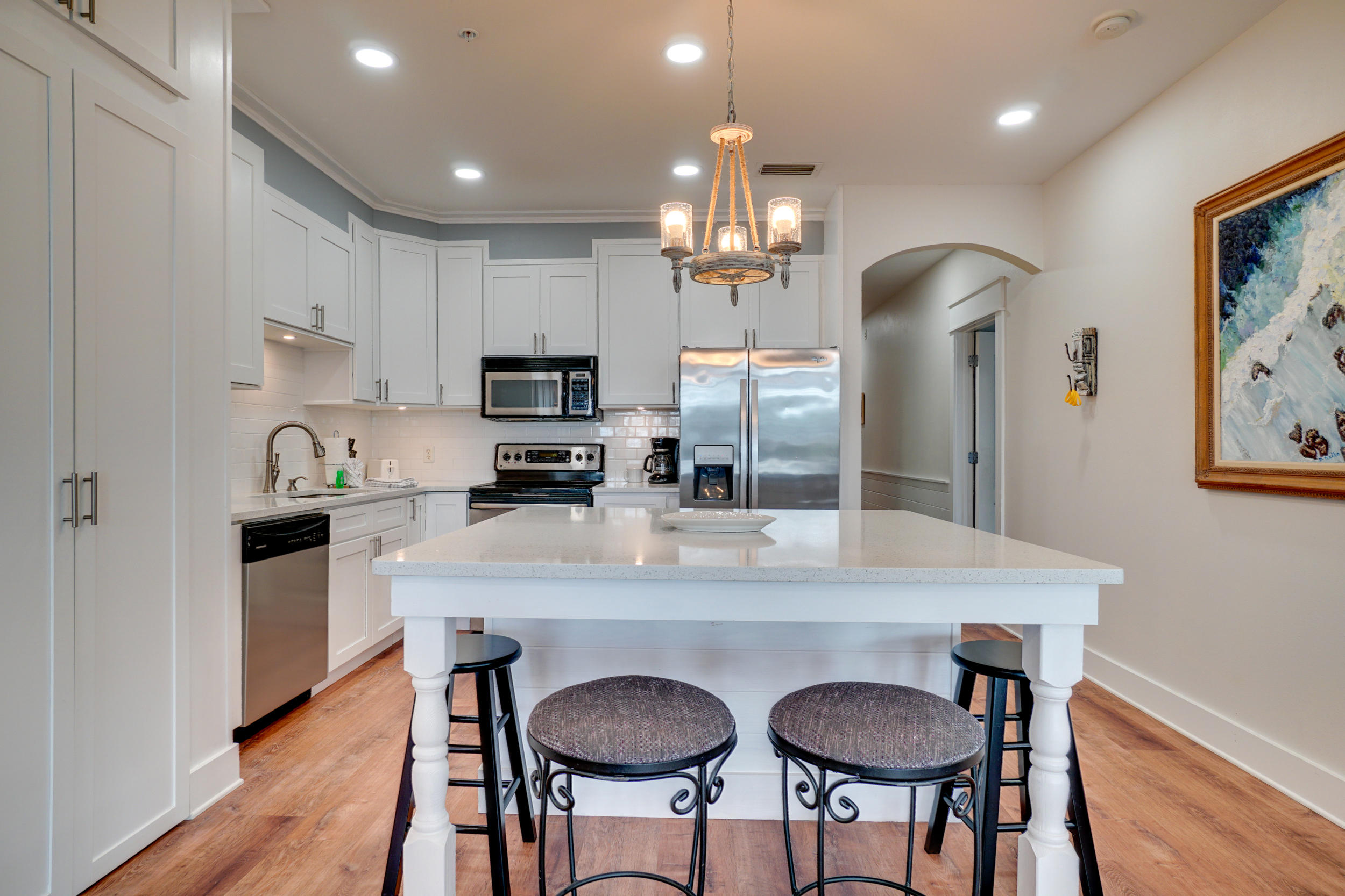 Step inside this RENOVATED TOP floor, open concept, 1944 sq ft, 3 bedroom condominium in the coastal community of Villas at Seacrest Beach! You will find an exquisite, gourmet kitchen complimented with the most beautiful quartz counter-tops & stainless steel appliances. This condo is your ultimate beach paradise, furnished throughout with the most clean contemporary style and charm. Among fine details, you will notice an electric fireplace in the living room with shiplap. All bedrooms are roomy, allowing plenty of sleeping room for guests. The wide-open master king bedroom, offers a large closet & master bath, two vanities, a whirlpool bathtub, and new quartz counters! Relax on the extra large, over 100 sq ft patio, or take a dip in the 1200 sq ft lagoon style pool! More upgrades in notes!