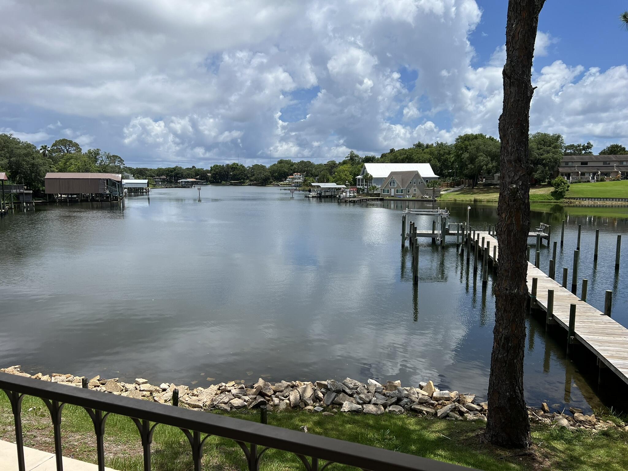 Completely renovated Waterfront condo for this price?! Yes, it's true. New kitchen; cabinetry (to the ceiling!), stainless steel appliances, including refrigerator, new bathroom with frameless glass shower, LVP flooring, all fixtures, new HVAC, electrical, plumbing, and water heater. Your own private balcony overlooking the beautiful waterfront of Cinco Bayou. Launch your kayak or paddleboards, fish from the dock or enjoy the sparkling pool!  This lifestyle for such a low price?!  Ready for you to move in, or your tenant (no short term rentals). You're going to want to see this one!
