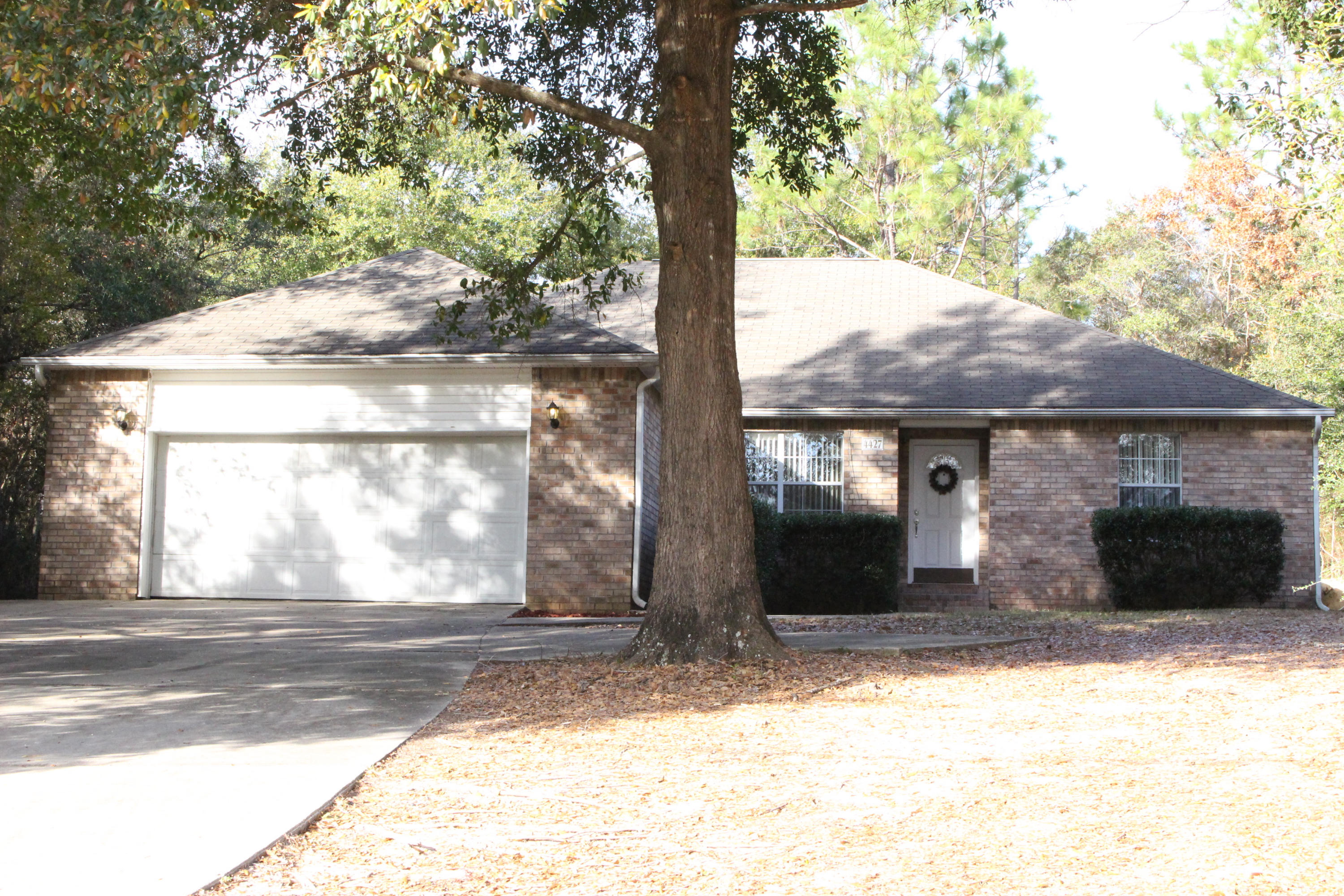 This beautiful brick home is located in Riverchase subdivision. This 4 bedroom 2 bath home has a 2 car garage with a shower and wash basin. There is a gas fireplace in the living room with tile floors. Large laundry room with built in shelving. Open kitchen has oak cabinets, pantry and microwave. South Crestview and close to base.