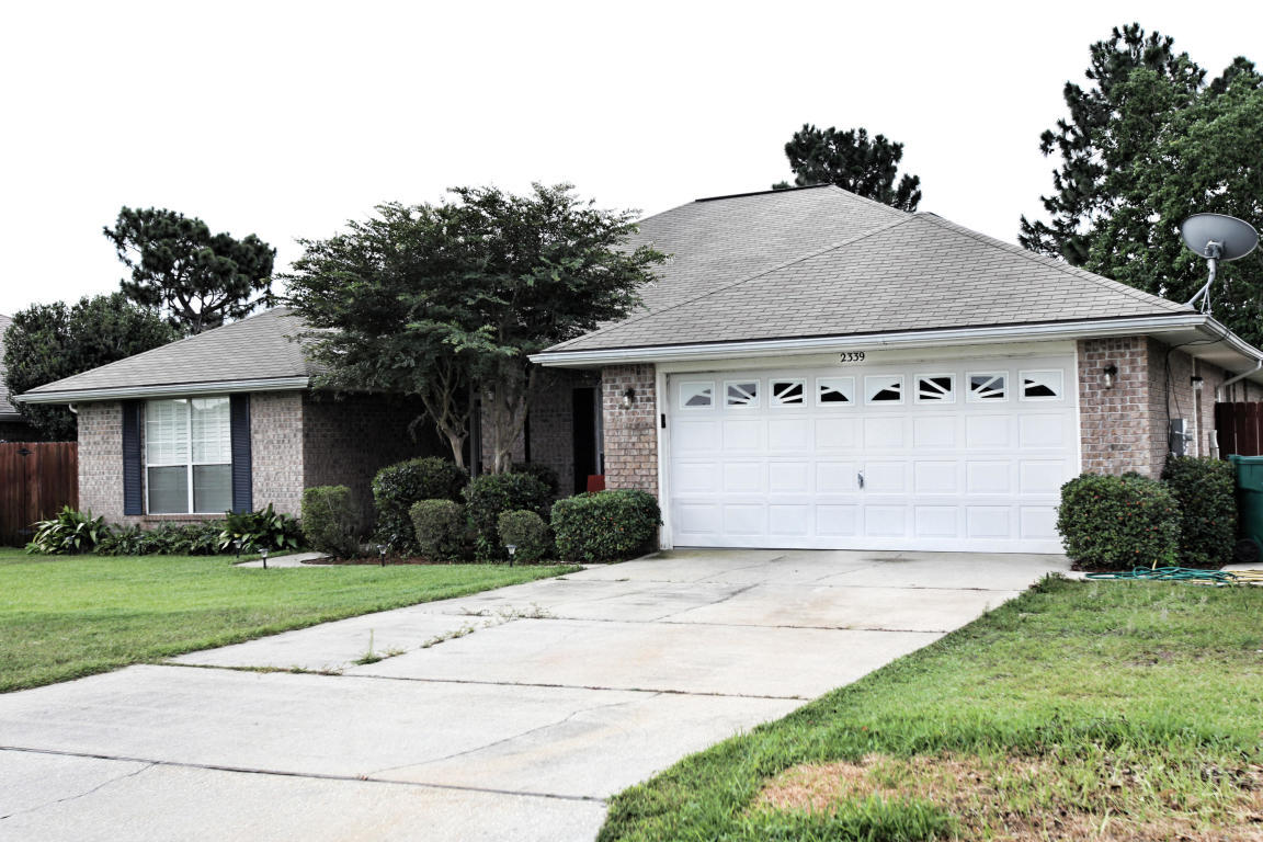SHORT SALE : Awesome home in East Navarre with easy access to HWY 98 and only minutes to the beautiful sugar-white, sandy beaches of Navarre Beach. Very nicely located just minutes from Hurlburt Field, the local YMCA and Navarre Youth Sports Association. This split floor plan home is move-in ready with upgraded features, open concept living, newer appliances, eat-in kitchen and formal dining room, and enclosed/screened-in Florida room within a fully fenced back yard. Lot and room dimensions are approximate and should be verified by buyer.