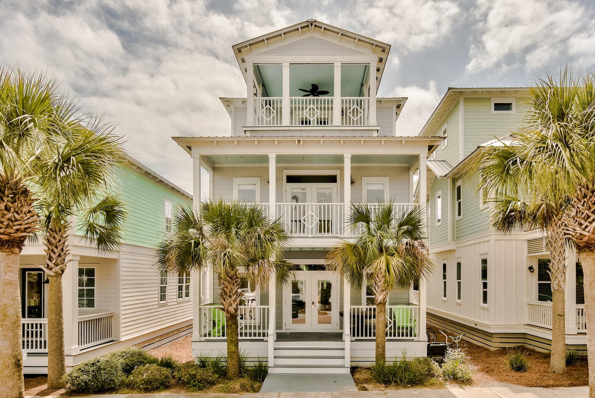 Nestled within the master planned community of Seacrest Beach, this 30A beach house spans three levels and over 2,400 square feet of thoughtfully designed living space. Upon approach the oversized porch ideal for outdoor dining and lounging leads the way to the living and dining area. The newly remodeled kitchen features ample cabinetry, a breakfast bar, and a luxury appliance suite. A bunk room with private porch and ensuite complete the first floor. 

Overflowing with natural light, the main suite on the second floor boasts space for a sitting area, a large walk-in closet, and a dedicated covered porch. Synonymous with relaxation, the marble adorned main ensuite encompasses a wet room with soaking tub, custom tiled shower, double vanities, and water closet. An additional bedroom currently configured with dual beds and an ensuite is also found on the second floor.  

Nestled atop the roof line, the viewing deck is the perfect place to admire the renowned Emerald Coast sunsets which provide a new palate of mesmerizing hues each and every night. The third floor is also home to a wet bar servicing the viewing deck and the fourth bedroom with ensuite. 

Geographically poised between the iconic town centers of Alys and Rosemary Beach, Seacrest Beach is minutes away from all of the world class dining and entertainment venues 30A has to offer. Community amenities include deeded beach access, a 12,000 gallon resort-style pool, 24-hour security, nature trails, and seasonal tram service to the beach. Impressive rental potential makes this a compelling opportunity for investors and full-time residents alike. Inquire today and discover why Seacrest Beach remains one of the most sought after communities along 30A.