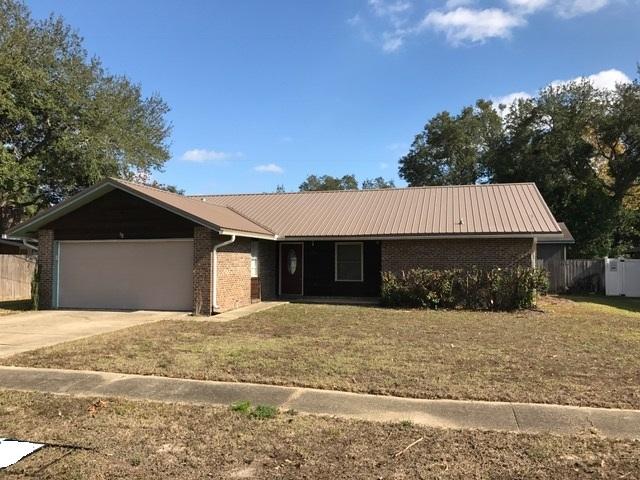 Beautifully remodeled 3BR home in a very convenient location. This home features an amazing new kitchen with loads of cabinet space, a separate dining area and spacious living room with fireplace. The Master BR has a cedar lined walk-in closet and plenty of room for your furniture. The backyard has a very nice screened patio, large fenced yard and an incredible workshop/shed with electric service.