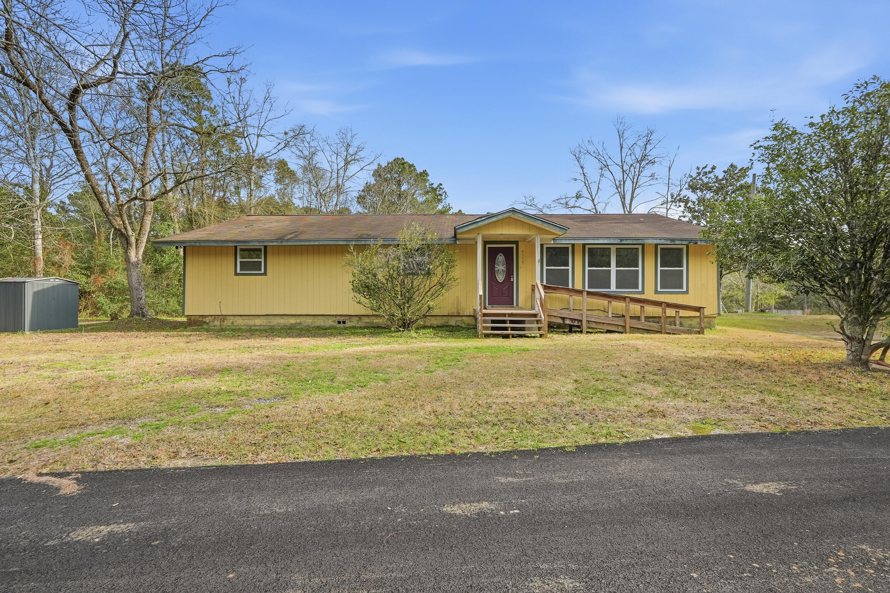 Welcome to your next great investment in a peaceful country setting with prime HWY 85 frontage - offering visibility for a cottage business or home based venture.
Generously sized rooms filled with natural light and a spacious kitchen is ready to be reimagined. The home boasts solid YELLOW HEART PINE construction. The subfloor is tongue and groove yellow heart pine as well - a rare and durable feature that speaks to the quality and longevity of the structure.
With strong bones and untapped potential, this property is ready for someone with vision to restore, renovate or repurpose. Whether you're  an investor looking for a project or a buyer dreaming of creating something special, this AS-IS offering presents a unique opportunity.  Bring your ideas and make an offer!!