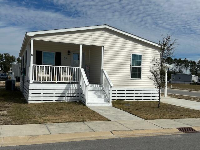 Riverwalk Landing is a welcoming and affordable 55+ retirement resort community. Amenities include Community Pool with and outdoor gas grills; Clubhouse with full kitchen, game room, social/party room, exercise room, showers/changing rooms, and card room;  Fire Pit; Two Pickleball Courts; dog walks and community activities.

The home features an open plan with split bedrooms and two full baths.  The home comes with a carport, shed and a small patio. 

Call for your private showing.