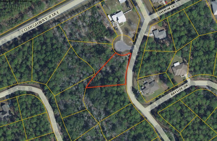 Almost a 3/4 acre, with mature trees, no HOA fees and great location. Close to the Freeport Regional Sports Complex, and Freeport Marina. Within minutes to the South side but on the quiet side of the Bay. Seller will finance with great terms with 50% down payment. Balance amortized over 15 years with balance due in 3 years Build your dream home on this great lot!