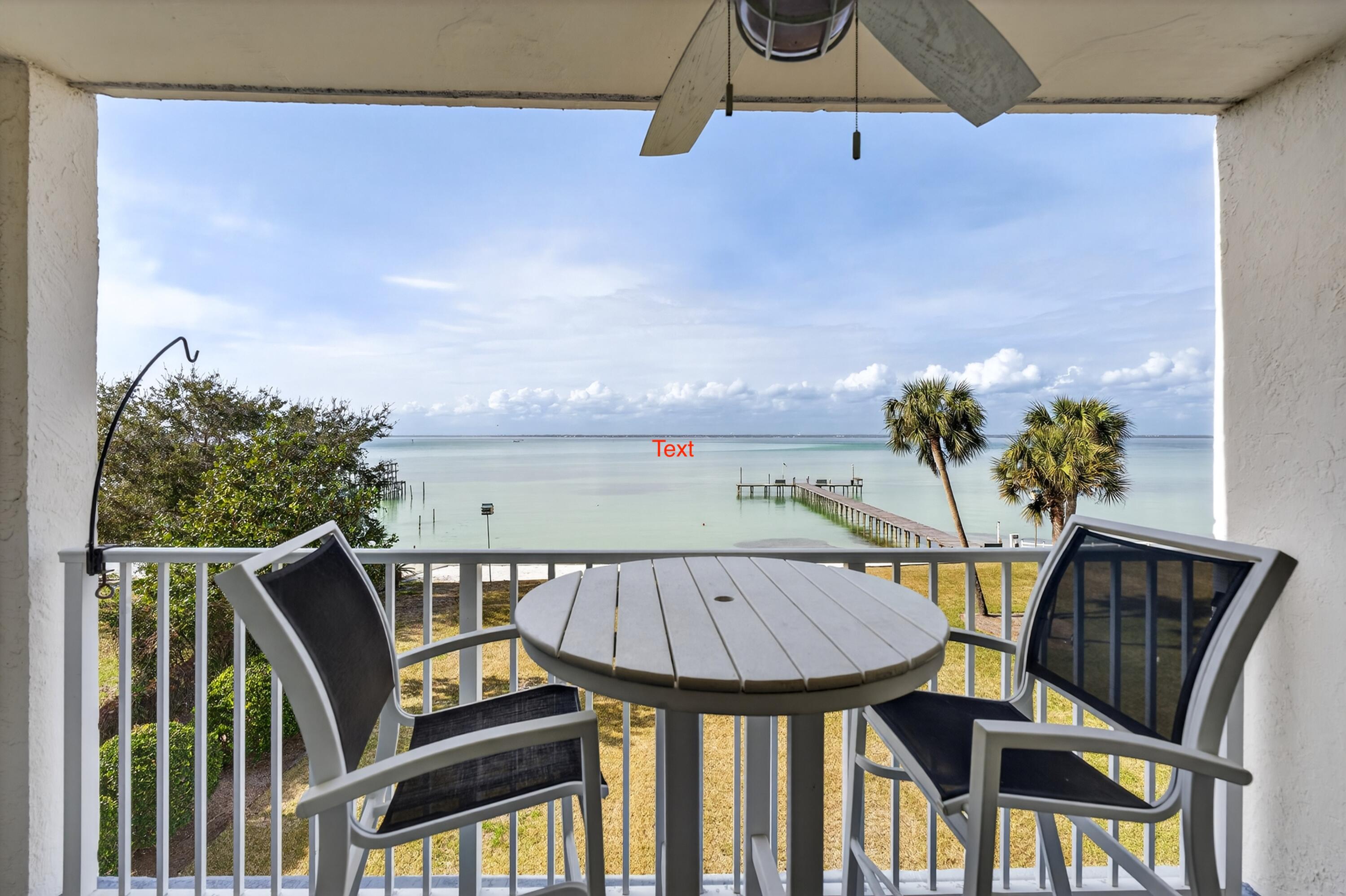 Rare opportunity to own a 3rd-floor end unit in the gated bayfront community of Valencia Condominiums in Destin, Florida. This 1-bedroom, 1-bath bay view condo offers a spacious private balcony overlooking Choctawhatchee Bay--perfect for sunsets, boat watching, and even dolphins playing. The end-unit location provides added privacy and natural light. Updates in 2022 include new HVAC, water heater, and electrical improvements. Valencia is a financially stable complex that has passed its Milestone and SIRS inspections, offering peace of mind for buyers. Community amenities include a bayfront pool, clubhouse, private dock (boat parking up to one week), sandy beach area, tennis court, kayak rack, locking bike shed, work shed, car wash station, 24-hour video surveillance, and two elevators. Convenient same-floor laundry eliminates in-unit maintenance concerns. **Additional HOA fee of $75/month includes internet and approximately 200 cable channels.** Ideally located just 1/2 mile to  HarborWalk Village, Crab Island, dining, shopping, parks, and the Destin Harbor. Excellent as a primary residence, second home, or long-term rental investment property. You won't want to miss rare find.