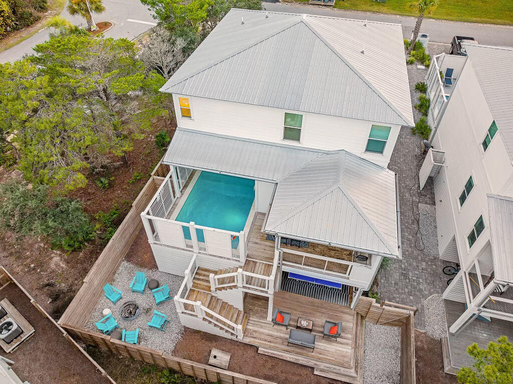 Discover a luxurious coastal retreat at 66 Seabreeze Trail, an exquisite two-story residence in Seacrest, strategically positioned a stones-throw away from the public beach access. This 5-bedroom, 5.5-bath masterpiece, constructed in 2020, seamlessly blends upscale design with the allure of beachside living.
As you step into this meticulously crafted home, you'll be greeted by cozy furnishings, upgraded hardware, and a host of top-tier appliances and decor, creating an atmosphere of refined elegance. The allure extends beyond the interior, with resort-like amenities including a heated pool, a captivating sofa swing, and a plethora of entertainment options such as ping pong, air hockey, darts, and cornhole in the expansive outdoor entertainment space.
Two master bedrooms, each boasting an en-suite bath, and a bunk room that sleeps 6 for the kids allows comfort and functionality coexist seamlessly. The second-floor wet bar, complete with a sink and fridge, adds a touch of sophistication to your entertaining endeavors. Notably, this property stands out as a rare gem by not being governed by an HOA, offering unparalleled freedom and flexibility.
The location is unrivaled, mere moments away from the charming shops of Alys Beach, the quaint atmosphere of Rosemary Beach, and the idyllic scenery of Seagrove Beach. Embrace the convenience of having these coveted destinations at your fingertips, promising a lifestyle defined by both sophistication and coastal charm. Currently serving as a high-end vacation rental, 66 Seabreeze Trail presents a unique opportunity to own a slice of coastal paradise. Live the 30A lifestyle to the fullest, where pristine beaches and upscale amenities surround you, and every detail of this remarkable home is crafted for an extraordinary living experience.