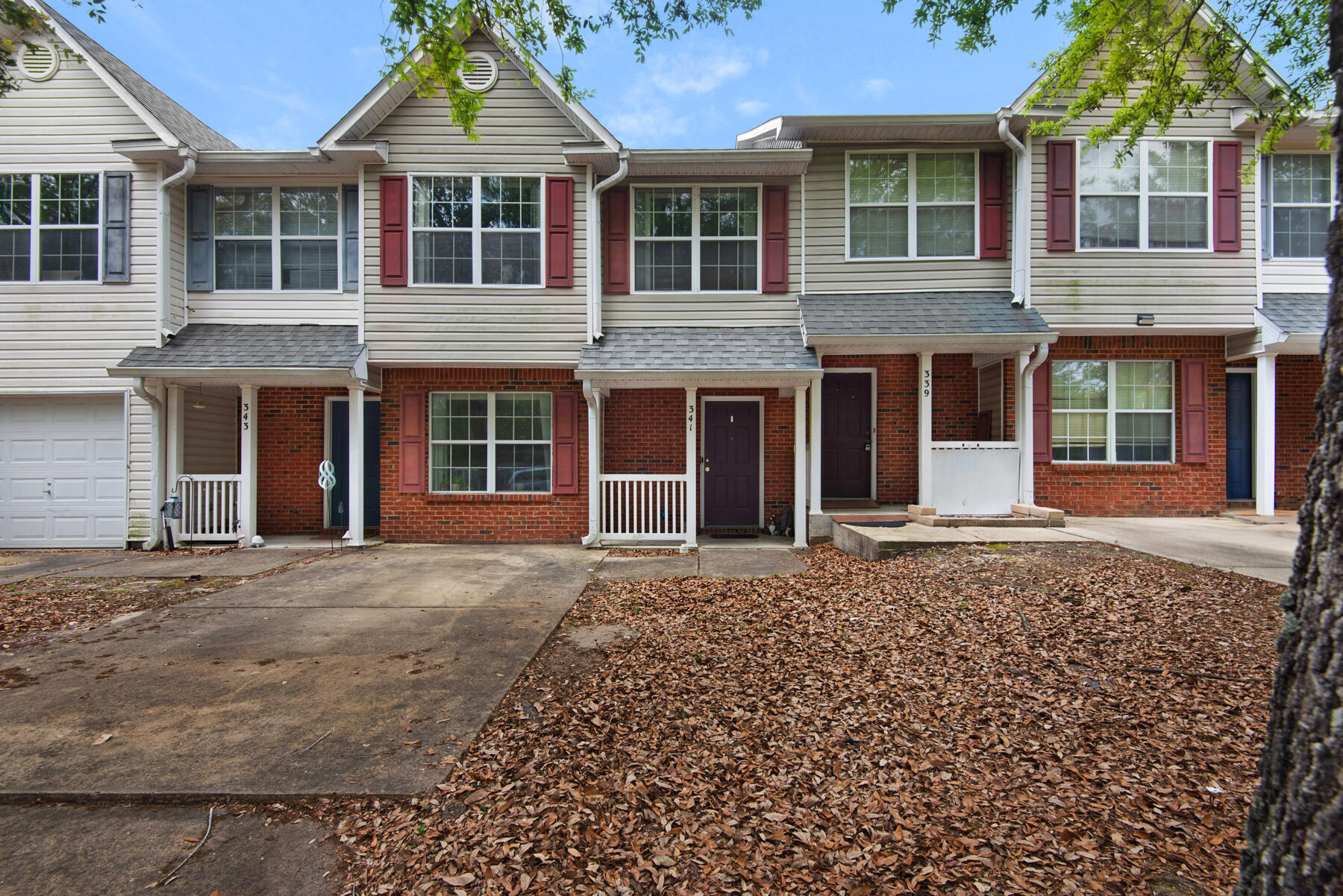 Available June 1, 2025! This spacious & well-maintained 3-bedroom, 2.5-bath townhome is the perfect place to call home. The main level features a bright & airy living/dining area at the back of the home, filled with natural light & a convenient pass-through kitchen that opens to a cozy den or formal dining room. Flooring includes a mix of carpet & durable luxury vinyl plank.
Upstairs, you'll find a generously sized master suite complete with a walk-in closet. Of the two additional bedrooms, one is carpeted & the other features LVP flooring ideal for flexible living arrangements. Laundry located on 2nd level (only stackable WD can be used-tenant to provide).
Enjoy a fully fenced backyard, perfect for relaxing or entertaining. Pet lovers, rejoice: the owner welcomes dogs of any size with a non-refundable pet fee. Plus, you'll appreciate the added convenience of overflow parking located just across the street.  All Coastal Realty Services residents are enrolled in the Resident Benefits Package (RBP) which includes renters insurance, HVAC air filter delivery (for applicable properties) and our best-in-class resident rewards program, and much more! More details upon application.