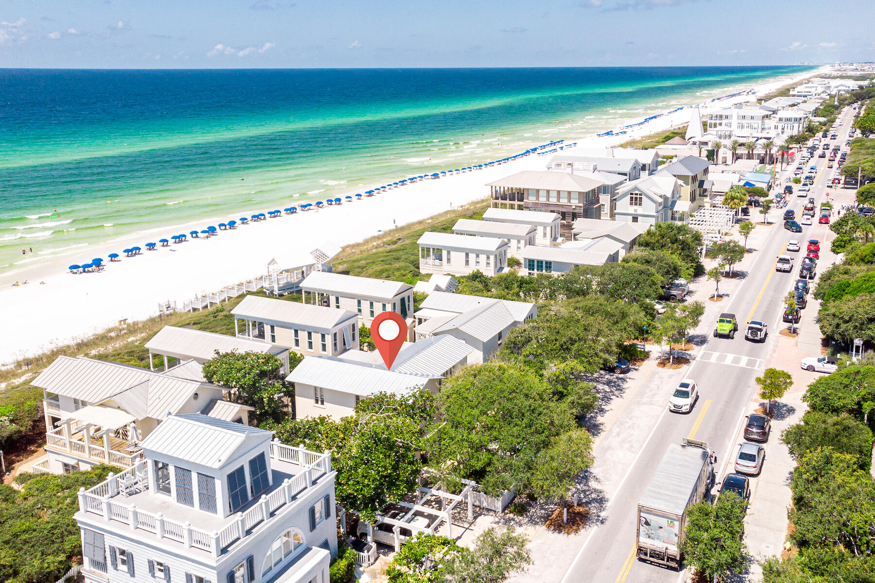 Located south of 30A and just steps to the East Ruskin Pavilion, this two-story beach cottage boasts an exceptional location with terrific gulf views. Stairs to the living area are just off the entrance foyer. Vaulted ceiling with exposed beams, built-in cabinets, floor to ceiling windows that allow plenty of light, are just a few highlights of the living room. The living area extends onto the covered porch with amazing gulf views and spectacular sunsets. The unique dining table with iron base and reclaimed pine tabletop seats six. The galley kitchen is waiting for the family chef. Stainless steel appliances include Subzero refrigerator, Wolf gas stove, KitchenAid dishwasher, and a wine refrigerator. The breakfast bar seats four. Guest suite with king bed also on second level. The master suite with king bed and ensuite bath are located on the first level west wing for privacy. The spacious second guest suite includes three custom built-in bunks plus a king size bed with storage beneath. Both guest suite and master suite have access to a screened porch with a quick walk to the beach. The kidos will race to line up at the outside shower after a day filled with fun building sandcastles. This beach cottage is in excellent condition and has never been on rental market since full remodel in 2012 completed by original builder. Two off-street parking spaces are provided. Park your car and enjoy a minutes' walk to beach and town square.