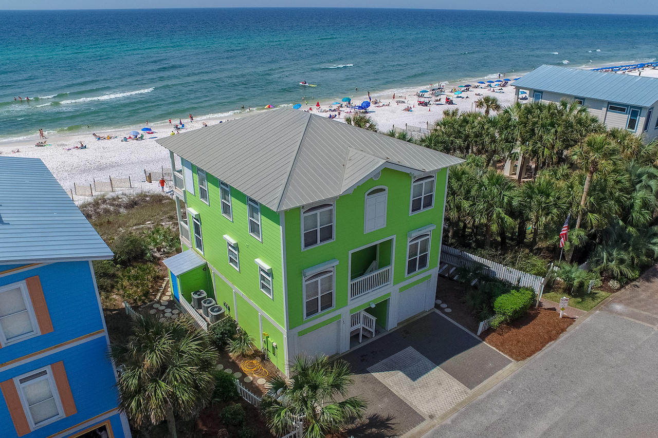 PRICED TO SELL ASAP!! Three-story home directly on the Gulf in the private family-friendly community of Sunrise Beach just steps from Ed Walline Park and a short walk to Gulf Place on 30A! Enjoy great sea views from full-length balconies and the home's many huge windows. The kitchen features a bay window, stainless appliances, and breakfast bar, while the open floor plan is great for entertaining. The home is currently furnished as a vacation rental: in addition to the large master suite, there are 2 additional bedrooms on the 3rd floor, a small bunk room on the main floor, and a huge bunk room on the first floor. If used as a primary or secondary home, the small bunk room would be ideal as a home office and the first floor would be a great family/play/media room, teenage hangout, or man cave.
Includes attached garages for 2 cars.
Buyer to verify all specifications and dimensions.