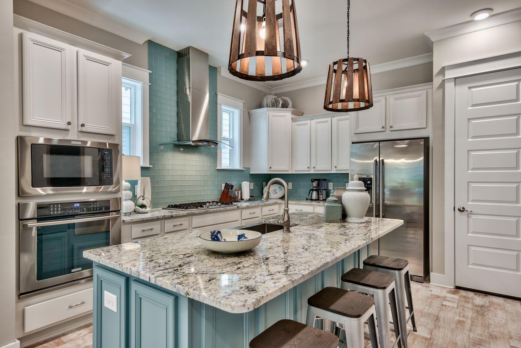 Fully furnished and turn-key ready for immediate occupancy, this coveted 3-bedroom townhome in Prominence is the perfect place to call home. Ideally located just 5 minutes from Seacrest Beach and Rosemary Beach, this upscale craftsman style beach retreat boasts an attached garage, beautiful hardwood floors, crown molding, quartz countertops, gourmet kitchen with stainless steel appliances, and quality coastal furnishings. Enjoy your morning coffee or evening glass of wine on the open-air back deck. Owners and guests enjoy world-class community amenities including a zero-entry resort style pool, gas grilling area, onsite shopping & dining at The Hub, and seasonal beach shuttle service.