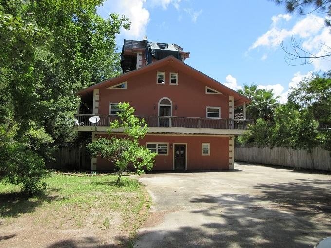 This big 5 bedroom, 5 bath REO home in Point Washington has so much potential and is located on a canal that offers access to the Bay! The home features an oversized attached garage, Mother-in-law quarters, a wrap around deck and a bonus room to mention a few. The location is close to State Parks, the bay, beaches, restaurants and employment opportunities.