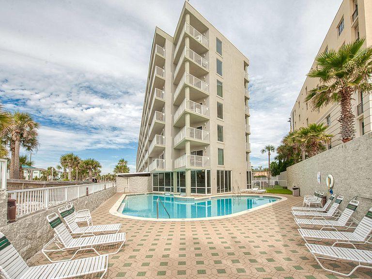 The Best Value steps from the Beach! the gorgeous 2 Bedroom and 2 Bathroom condo is an amazing rental powerhouse and approved for VA financing. the 3rd floor balcony view faces west and looks over the neighboring county beach access and down the shoreline PERFECT for those summer sunsets!  this condo is on a vacation rental program and available by appointment only. it will not last long. Video walk thru  https://youtu.be/LQZrcbEzVq4 
seller is a licensed real estate professional. buyer to verify all dimensions and info