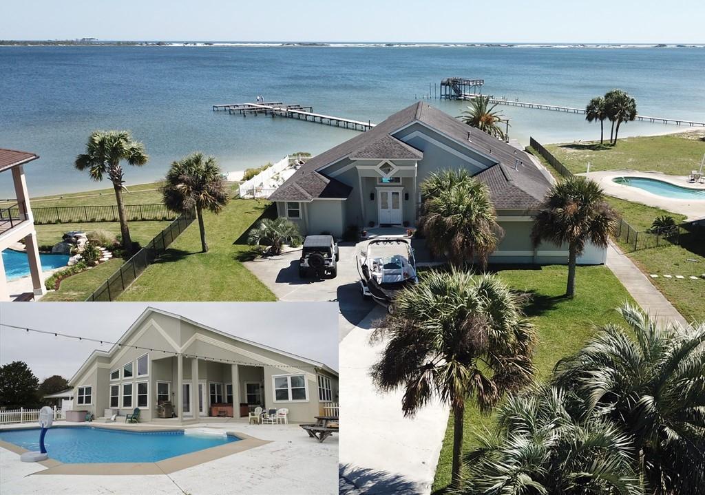 Absolutely stunning .56 acre waterfront home on a convenient, but low traffic cul-de-sac in the heart of Navarre. It was completely renovated in 2015. This beauty is 2369 sq ft, has 4 bedrooms and 3 bathrooms with an in-ground pool and access to the community dock on Santa Rosa Sound. The home has a great kitchen with an oversized island and plenty of storage. The stainless-steel appliances will convey with the property and include a gas professional quality chef's stove. The main living area is open concept with a view of the sound from the kitchen, dining area, and living room. It has a split-bedroom plan with the master bedroom and master bath on the opposite side of the house from the other three bedrooms and two baths. The master bedroom has a sitting area looking out to the pool and sound.  Flood insurance is not required for this property.  Must see to appreciate!
