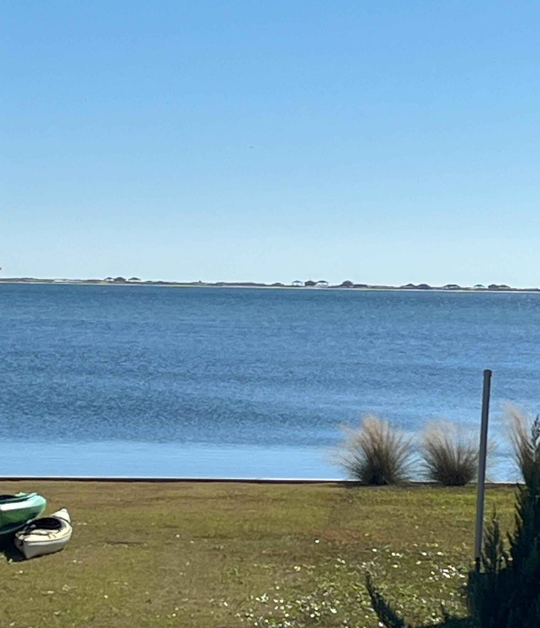 Welcome to this spacious and inviting 0.38 acre vacant lot, located in a desirable area and abutting a greenbelt 6+ acre Conservation Parcel for ultimate privacy. Private beaches await you across the Sound, where the National Seashore sits between Navarre Beach and Pensacola Beach. This prime piece of land offers a wonderful opportunity to create your own personalized oasis. With its generous size and versatile layout, the possibilities are endless.  Nestled in a peaceful neighborhood, this lot boasts a serene ambiance, ideal for those seeking tranquility and privacy. Surrounded by lush greenery and mature trees, it presents a picturesque setting that can be transformed into your dream retreat.  Once you've built your dream home to capture the amazing water views of the Intercoastal.... Waterway/The Sound from your balcony.

Conveniently located near various amenities, including shopping centers, schools, parks, and the zoo, this lot offers the perfect balance between seclusion and accessibility. Enjoy the convenience of being just a short drive away from major highways, ensuring easy commuting to neighboring cities.

Additionally, this lot benefits from access to essential underground utilities, such as water, gas and sewer.  The neighborhood also boosts decorative black streetlamps, sidewalks, storm drains, and curb gutters.

Immerse yourself in the endless possibilities this vacant lot presents. Don't miss out on this incredible opportunity to turn your dreams into reality.

Please let me know if there's anything else I can assist you with!