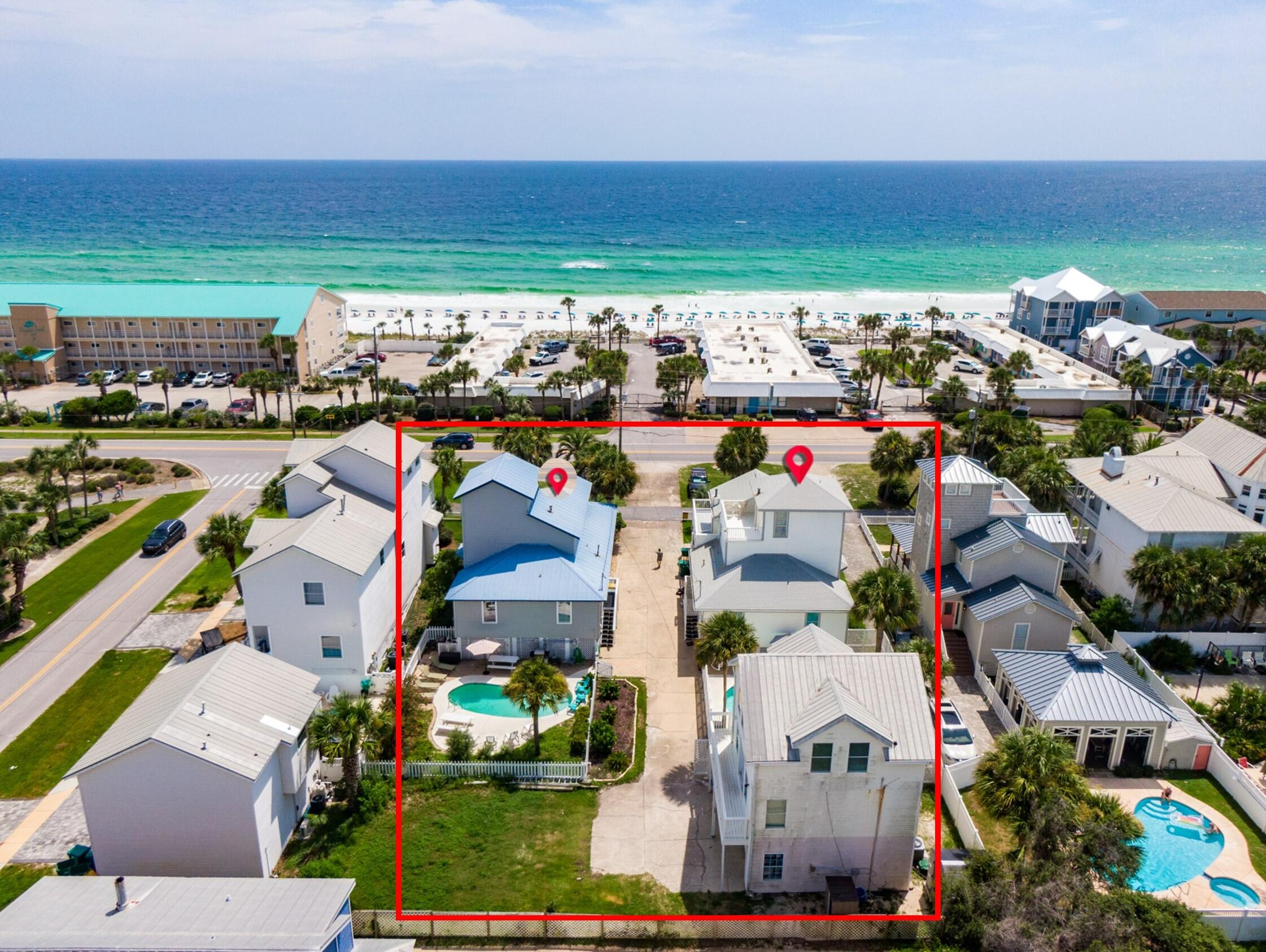 Here is a great opportunity to own three homes across the street from the Beach in Crystal Beach. This property features two 3BR/2BA three story houses and a two story 2BR/1BA carriage house. 
3171 includes a wraparound porch and second level deck just off the master bedroom. The first level has a spacious living area with a fireplace, large dining area with lots of windows, kitchen features granite counters, two guest bedrooms and a full bathroom. The second level is the large master suite, master bathroom and large deck with Gulf views. There is a court yard pool and garage as well and this home has not been used as a rental. 
3175 the first floor has two bedrooms, guest bath, living area, kitchen, and separate dining area.