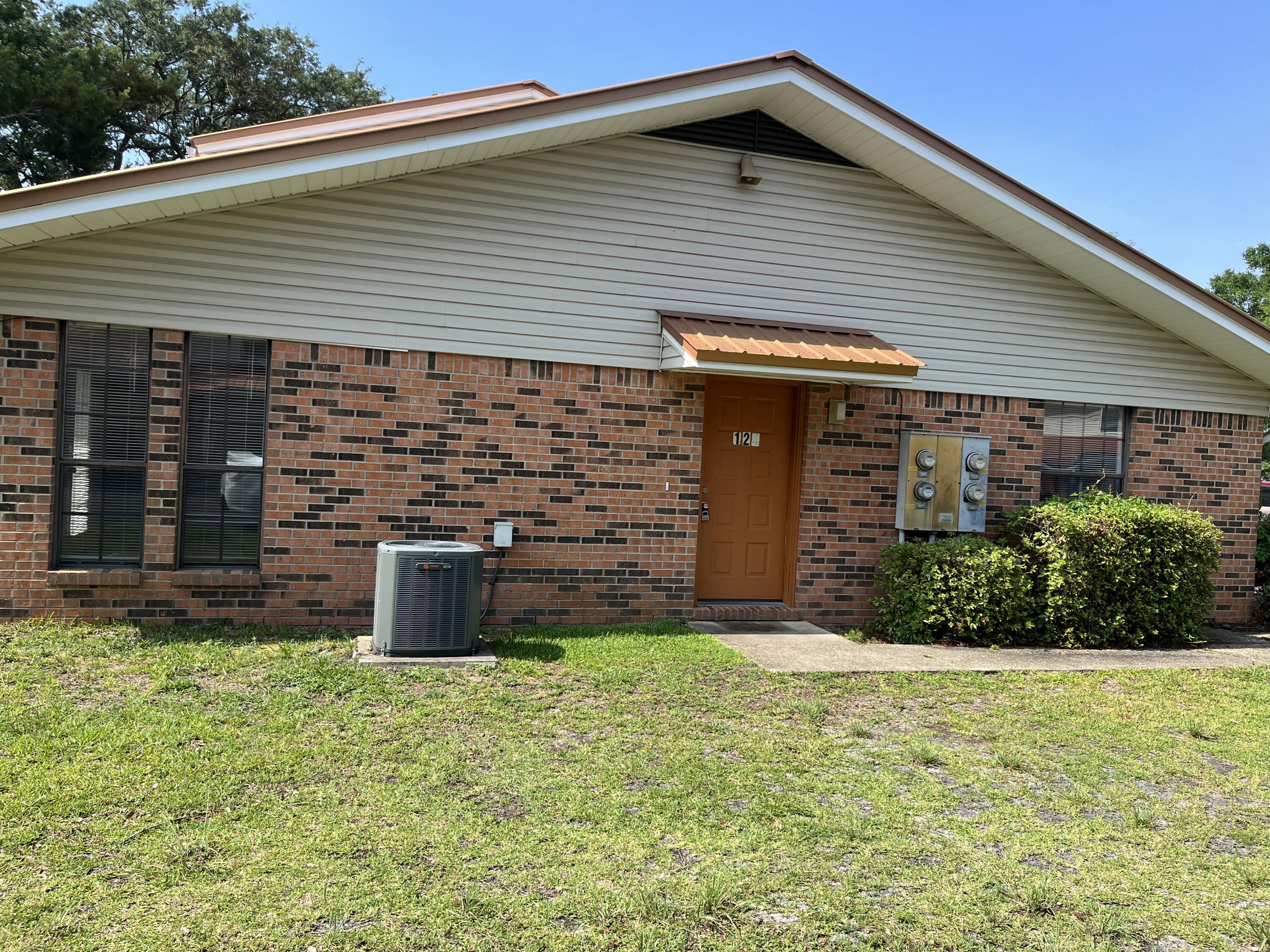 Spacious one-story end unit townhouse convenient to both bases. Inside washer/dryer hookup. Breakfast bar. Extra storage out back. Fenced back yard. Sorry no pets.