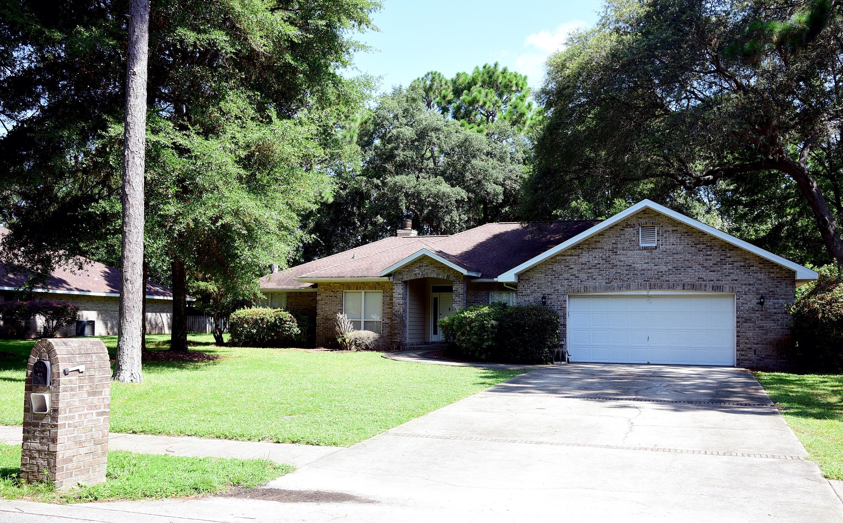 Great home, greater location! Close to schools, shopping, military bases and the beautiful emerald coast beaches. Entrance opens to a great room with fireplace, double set of french doors that lead to a large screened-in porch. A roomy dining room faces the front of the home. To the left is a bonus room, can be used as a den, office, play area-unlimited possibilities! Updated kitchen with a large breakfast area that passes to a door into the backyard. The large master bedroom boasts a large master bathroom suite complete with a separate shower and bathtub, double vanity and walk-in closet. The 2 spacious guest bedrooms have their own vanities and share a bath. NO PETS, NO SMOKING. Any person 18 years old or older need to complete an application.  Tenant must carry renter's insurance