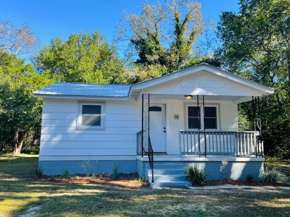 Immaculate two bedroom, one bathroom Florida Cottage with a bonus room that would be perfect for an office, dining room or play room! Brand new flooring, paint, HVAC, Windows, Insulation, Bathroom & Kitchen makes this the coziest of places to call home! Easy access to all of DeFuniak Springs, but still tucked away! Rental requirements are that you make $3000 per month, have a credit score of 600 and one year on the job! Application along with background and credit check will be required!