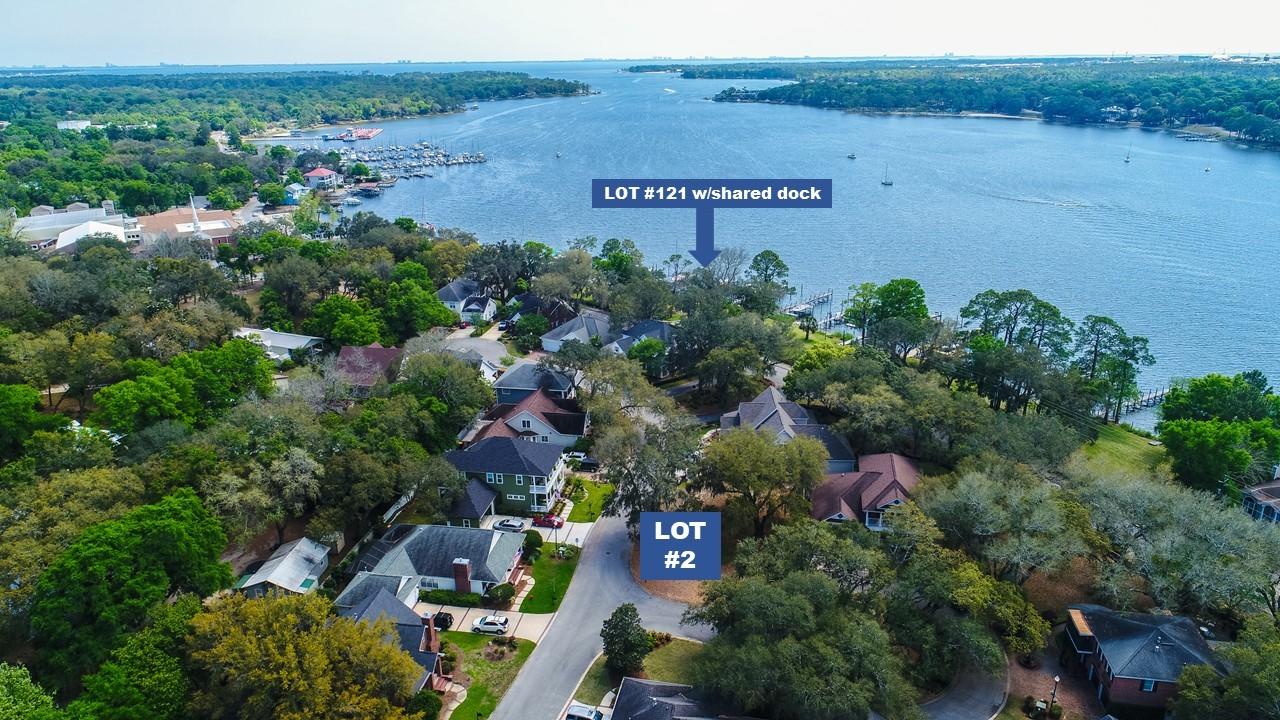 DEEP WATER, RARE OPPORTUNITY! This is one of only 3 remaining home sites in the Grand Oaks subdivision. The sale of this home site includes Lot 121 on the water (BOGGY BAYOU), across the street .
