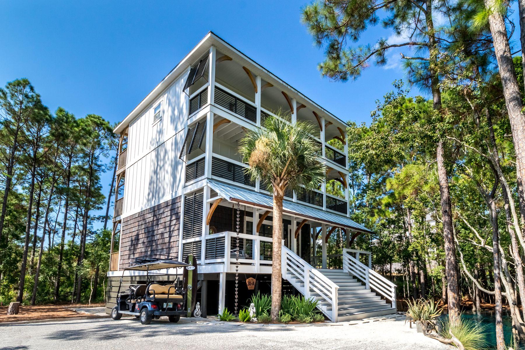 Nestled on a private wooded lot that includes a stunning natural aquifer water feature, this contemporary three story coastal home is quite unlike any other. Similar to a spring-fed lake, the surreal freshwater pool maintains the same level as the water table, providing a breathtaking water feature for attracting birds and wildlife. Sit quietly on the covered porch and enjoy the peaceful environment surrounded by native greenery. After dark, it's a wonderful place for stargazing or toasting marshmallows on the glowing fire pit.
This remarkable beach house is immaculate inside and out, with timeless dcor reflecting its natural surroundings. The home takes its inspiration from the nearby beach and woodland setting with shiplap walls, rustic timber features and cedar-like shake shingle Nestled on a private wooded lot that includes a stunning natural aquifer water feature, this contemporary three story coastal home is quite unlike any other. Similar to a spring-fed lake, the surreal freshwater pool maintains the same level as the water table, providing a breathtaking water feature for attracting birds and wildlife. Sit quietly on the covered porch and enjoy the peaceful environment surrounded by native greenery. After dark, it's a wonderful place for stargazing or toasting marshmallows on the glowing fire pit.

This remarkable beach house is immaculate inside and out, with timeless décor reflecting its natural surroundings. The home takes its inspiration from the nearby beach and woodland setting with shiplap walls, rustic timber features and cedar-like shake shingle siding. Laminate wood floors flow through the dining area to the open kitchen. The well-planned chef's kitchen includes a black quartz breakfast bar, a full range of custom cabinets, stainless appliances and a wine fridge, perfect for serving wine and beers at the right temperature. A door leads out onto the upper deck for dining al fresco and the built-in bar creates an informal gathering point for entertaining family and friends. A beautiful open staircase leads up to three bedrooms and a second floor study with front and rear balconies providing quiet retreats on every level. The master bath includes a corner tub and rain head shower with treetop views from two corner windows. 

Notable amenities include ample parking, covered porches and decks, freshly painted interior, new wood laminate flooring throughout plus many additional updates. 

This natural Eden is close to deeded beach access and has the advantage of no HOA. This home offers exceptional proximity to 30A's newest beach access equipped with ample parking and public restrooms. It also has a private beach access at the end of Bishop Rd. Close to Stinky's Fish Camp on 30A along with golf, shopping, restaurants and bike trails, this is one house you can never replicate.