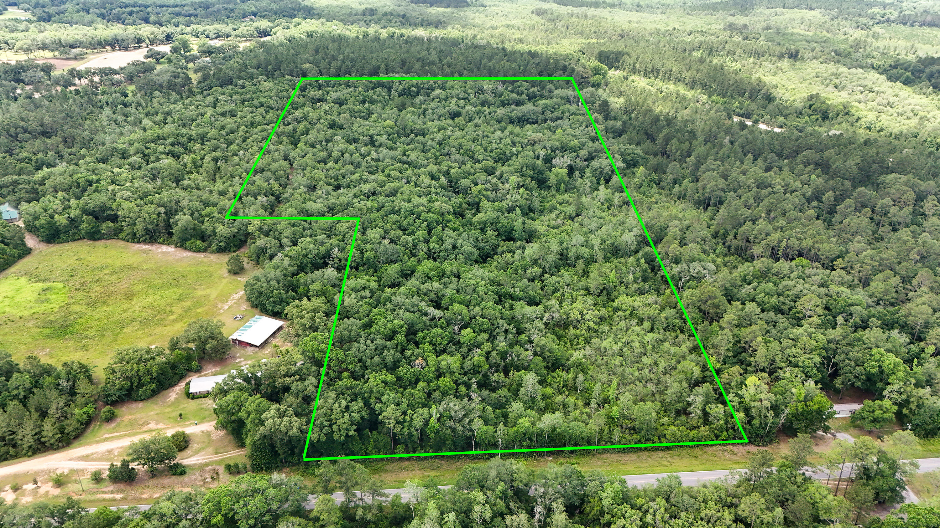 Discover 25 acres of stunning hardwoods offering a peaceful retreat in the heart of Northwest Florida. This expansive, wooded parcel provides a blank slate for your vision—whether you're looking to build a private estate, create a recreational getaway, or simply embrace the beauty of rural living.

Conveniently located just 45 min from Panama City Beach and Northwest Florida Beaches International Airport, and only 15 miles from Chipley, this property blends seclusion with accessibility. With ample space for outdoor enjoyment, it's ideal for nature lovers, hunters, campers, or anyone seeking tranquility surrounded by the unspoiled landscape of the Florida Panhandle.

Don't miss this opportunity to own a slice of Florida's natural charm-where privacy, potential and peaceful living meet.