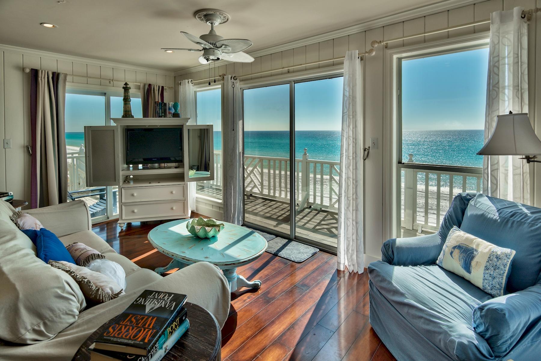 Gulf Front Masterpiece with Strong Rental History. It may be impossible to outshine waking up to the sun sparkling off the emerald green Gulf of Mexico outside the window and going to bed with moonlight beams dancing on the same beautiful water mere steps from the deck of this wonderful, 6-BR beachfront house. The rental revenue stream tops $180,000 per year, and personal vacations will wow family and friends to the horizon and back. Open living spaces embrace an unusual architectural concept with intriguing textures and materials. Two stories of open space have cream vertical shiplap walls, and the second floor has open balconies around three sides overlooking the living room and marble fireplace. Granite counters, stainless steel appliances and breakfast bar make a delightful kitchen which opens to the living room and dining area with views of your own 78 feet of Gulf of Mexico frontage. Amazing ocean vistas swing 180 degrees from east to west through large windows and sliding glass doors. Privacy reigns in this low density area surrounded by Grayton Beach State Park with nearly 2,000 acres of coastal forest and waterfront. This is a home which will not stay on the market long. The views, Gulf frontage, rental income, charming interior and unrivaled location creates a property with timeless appeal and coastal character.