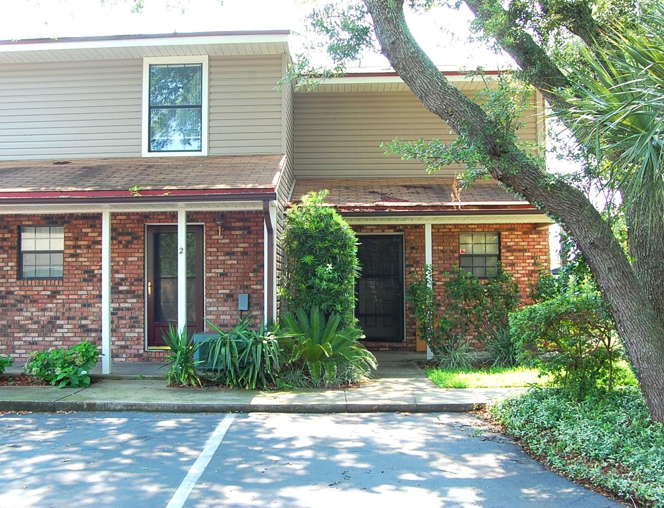 Welcome! From the front porch with blooming hyacinths to the screened in private balcony, this townhome provides comfortable living. The roomy kitchen features all appliances and tile that extends to the formal dining room. Enjoy the carpeted living room as you make yourself at home. The screened-in back porch provides additional room for relaxation. Upstairs, each bedroom has its own full bath. Sorry, pets are not negotiable. Available December 10.