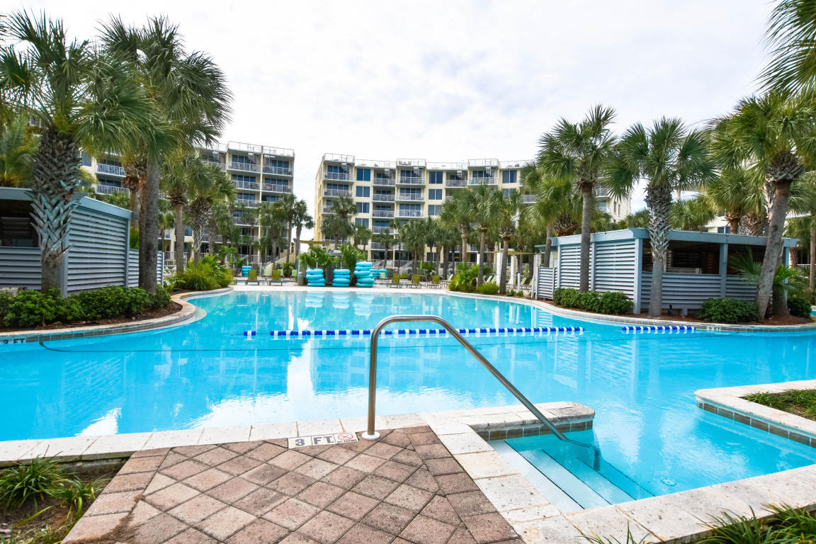 This lovely condo has a great view of the bay and easy access to the lazy river pool. Just across the street are the famous Gulf of Mexico beaches. Lots of great amenities for making family vacation memories. Cash in on $$ high dollar $$ summer rentals. Many great restaurants and attractions near by. You get the best of the beach and the bay at this highly desirable resort. Move in ready and stylish. Buyer to verify all information.