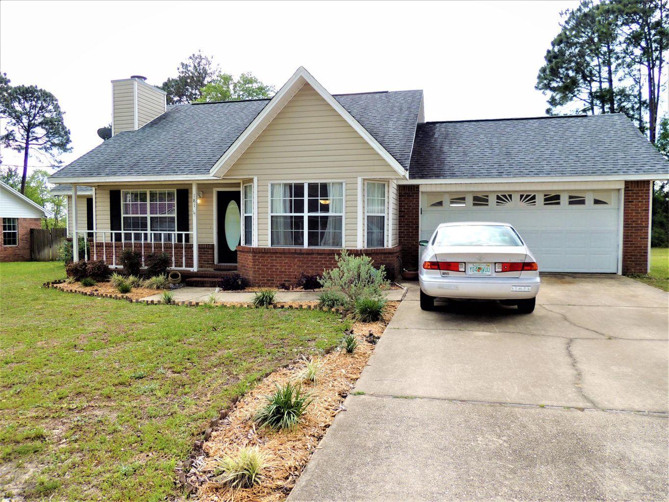 This adorable 3 bedroom 2 bath home welcomes you from the moment you enter the front door. It has a stone wood burning fireplace, custom solid wood cabinets in the kitchen with an beautiful bay window and built in desk area. Updated wood laminate flooring throughout the home. This home has been well kept and cared for and is awaiting its new home owners to arrive. Home also offers a full size 2 car garage and sits on over a 1/3 acre lot and is located in south Crestview zoned for the most desirable Antioch elementary school.