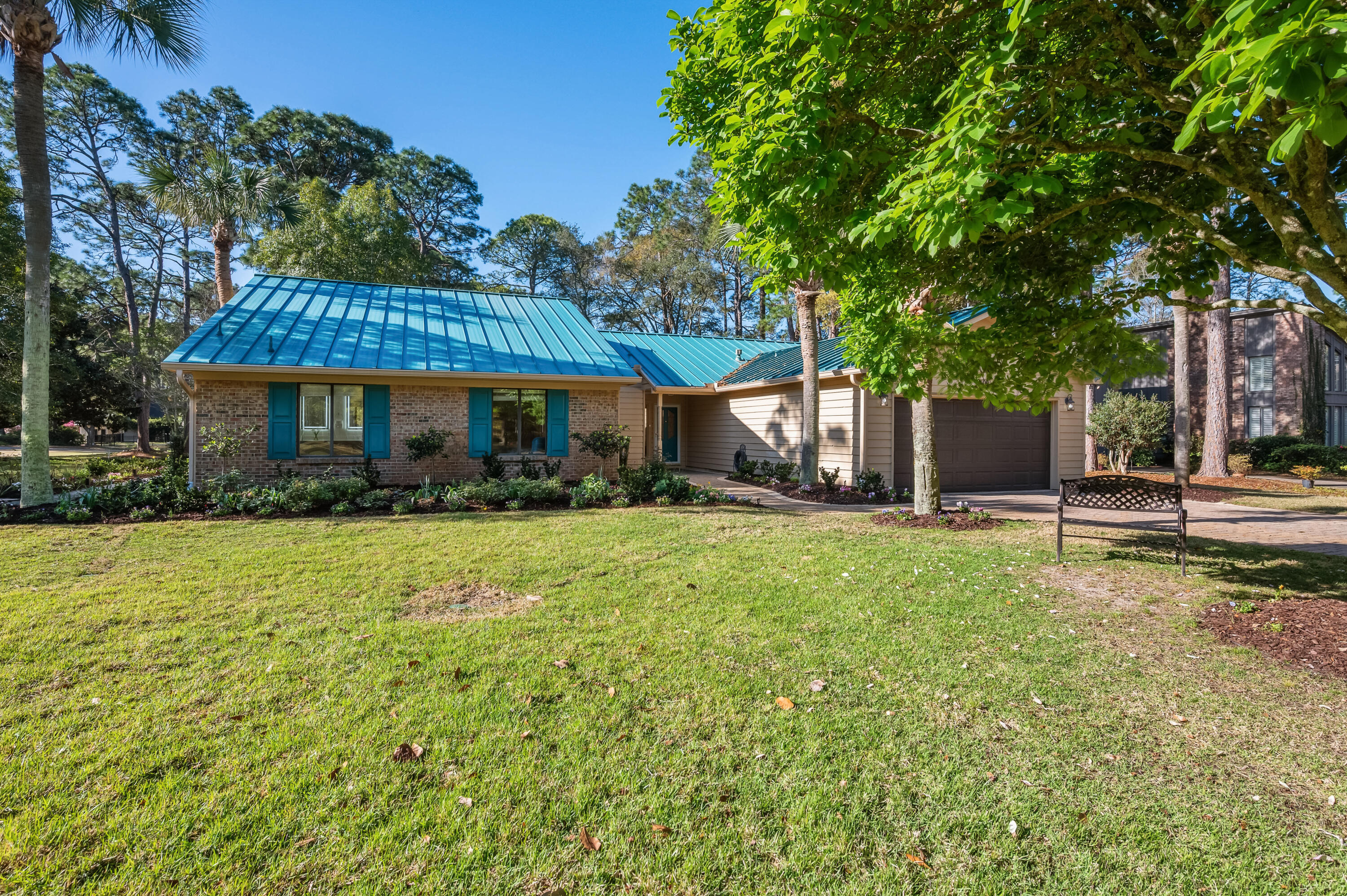 Welcome to your private oasis in the heart of Niceville! Nestled in the desirable Bluewater Bay community, this beautifully renovated home shines with joy and charm and provides direct access to the Bay golf course on hole #5. 
Lush, manicured landscaping creates stunning curb appeal and a serene outdoor retreat. Inside, enjoy a fully updated kitchen featuring modern finishes, perfect for entertaining. The luxurious primary suite boasts a recently updated spa-inspired bath, while the guest bathroom has been tastefully remodeled for comfort and style. Bright, open living spaces and thoughtful upgrades throughout make this home truly move-in ready. Prime location near top schools, parks, and bases--this is Florida living at its finest!