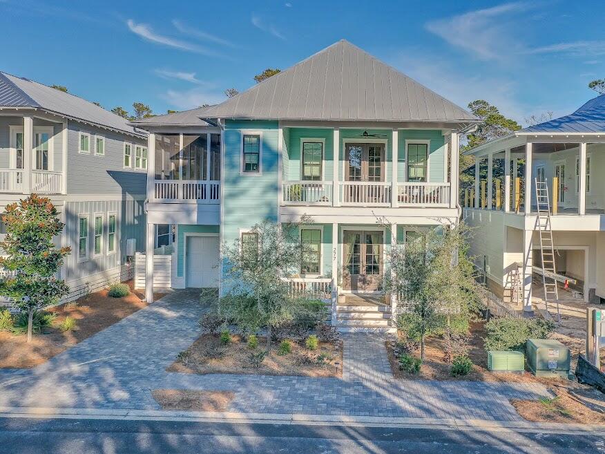 Within the gated neighborhood of Lakeside at Blue Mountain Beach lies this incredible residence built as a personal home, that has never been rented. Custom touches greet you throughout this beautiful 3 bedroom / 3.5 bath home with two living room areas and a huge screened in porch that allows for relaxing outdoor living. Enjoy hanging around the firepit with friends in a secluded back yard that backs up to Point Washington State Forest. Beach access with parking, restrooms and shower facilities is located less than half a mile south from the entrance to this neighborhood. The community offers a neighborhood pool and a trail that leads to Redfish Village, which provides shopping & restaurants just a short walk away.