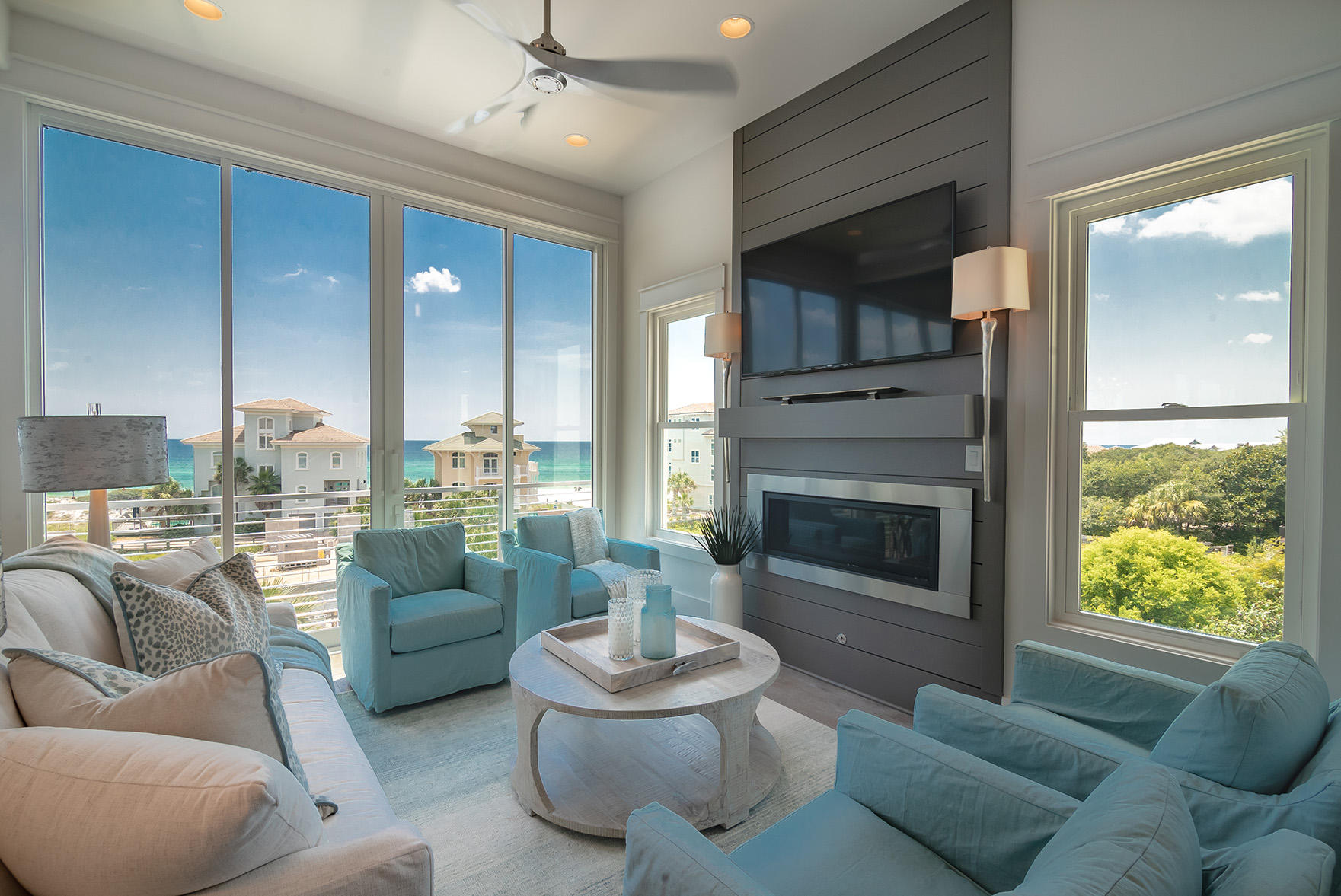We are proud to present the charming gated community of Caspian Estates located South of 30A in Santa Rosa Beach. It consists of 9 home sites including 4 existing homes and a community pool all just steps from the beach. We have completed construction and sold the first of the remaining five home sites. This home has Sq Ft, 5 bedrooms, 5 full baths and 2 half baths. There are many unique features including an elevator that will take you to the enclosed rooftop terrace with Bedroom, full bathroom, wet bar, gathering area with doors that open to multiple observation decks all with a Gulf view and a grilling deck. The first floor greets you with a private foyer, elevator, laundry, guest room, full bath and a staging area with refrigerator, sink and ice maker. The second floor contains a guest bedroom with a private bath, a second guest suite with sitting area, walk-in closet, spa bath and a private covered deck. The main living floor, boasts the gourmet kitchen, dining room with X-Beam ceiling detail, a spacious living room with fireplace, retractable sliding glass wall door with Gulf views and a guest suite with private laundry and half bath. The 4th floor, with elevator access, boasts the Master Suite, Gulf view entertainment room with wet bar, half bath and access to the covered Gulf view terrace with views for days! With the guidance of Melinda Birnberg, MelB Designs of Atlanta, this home will be professionally furnished, styled and ready for your enjoyment upon completion Summer of 2018. 
Kevin with Gotsch Studio is the architect for the project at Caspian estates along with Developer, Catherine Dozier and Simmons Custom Home Builders. Their vision for this project was to create a contemporary oasis in the heart of this established beach community South of 30A.