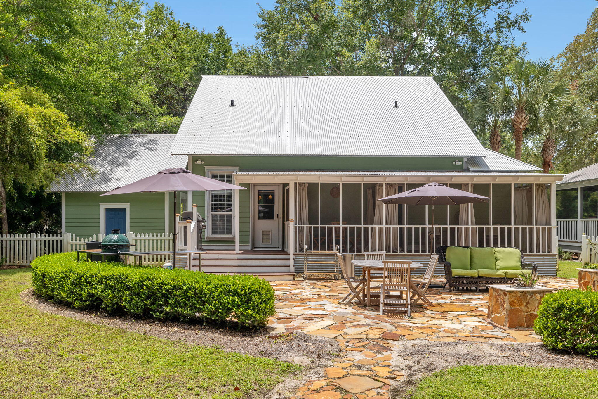Charming Florida-style cottage in Point Washington! This well-maintained 3-bedroom, 2.5-bath home offers an inviting open layout with high ceilings and beautiful pine flooring throughout. The main-level primary suite adds everyday convenience, while the functional floor plan provides comfortable space for guests or full-time living. Enjoy a detached carport plus a storage/workshop area, perfect for beach gear, bikes, and extra storage. Offered furnished, lightly used, and truly move-in ready—don't miss the opportunity to own a classic coastal home in a prime location.