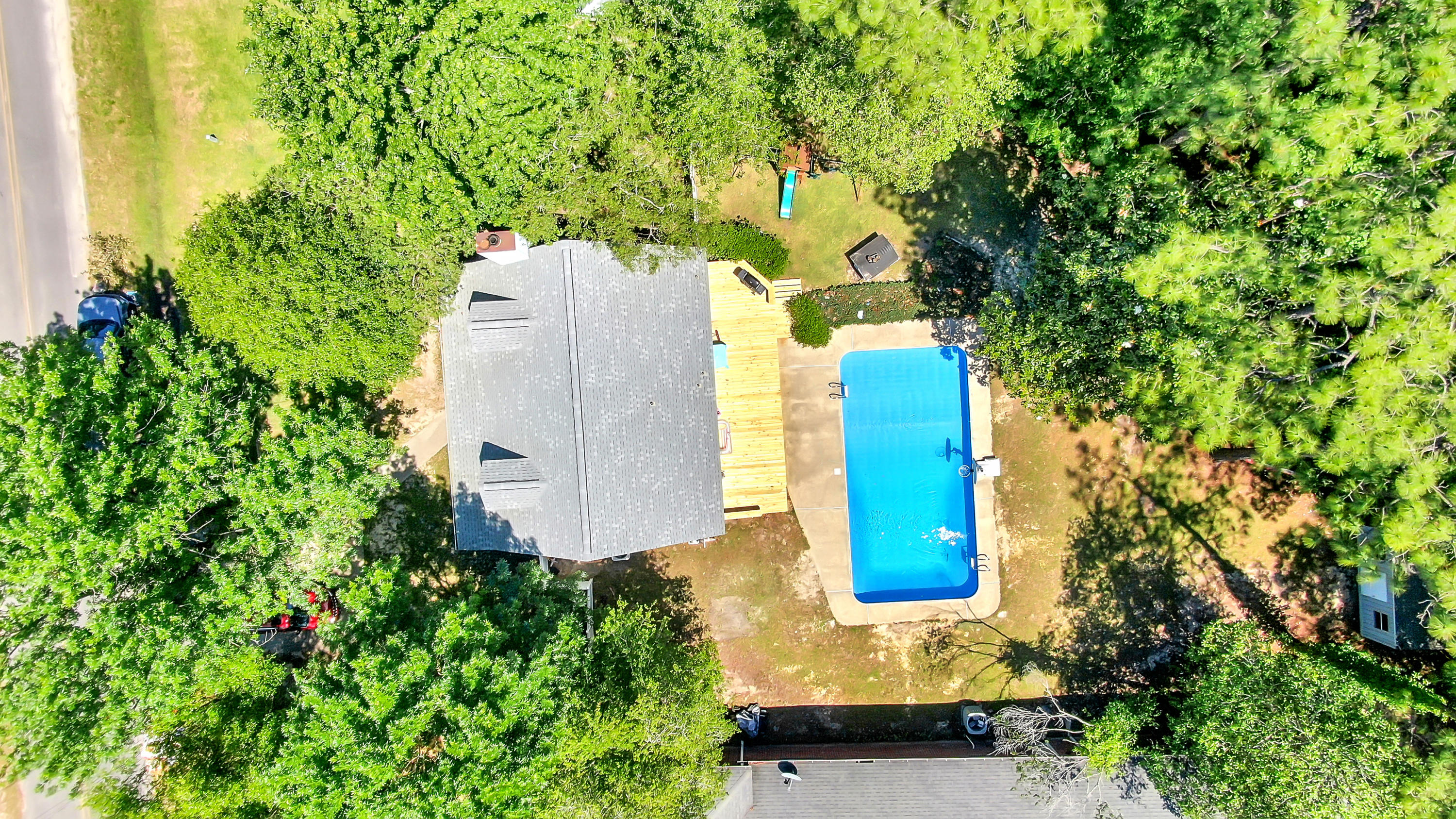 Did we find your unicorn? Perhaps! A 4 bed/2bath pool home in a small, popular neighborhood, on a 1/2 acre just outside of town? Yes, indeed! The pool even has a brand new liner! You'll love the downstairs master with the kids' rooms upstairs. The kitchen is spacious and even has room for an island plus dining area and has lovely views of your back yard and pool! You'll find a brand new deck and in ground pool with new liner. Kids' bedrooms don't skimp on size either! No rear neighbors - just woods, on an extra deep lot. Neighborhood is on the smaller side with winding street, great for walking or bike riding! Qualifies for all types of financing and seller will even gift the buyer $2500 in closing cost assistance with an accepted full price offer. Don't wait to schedule your private tour!
