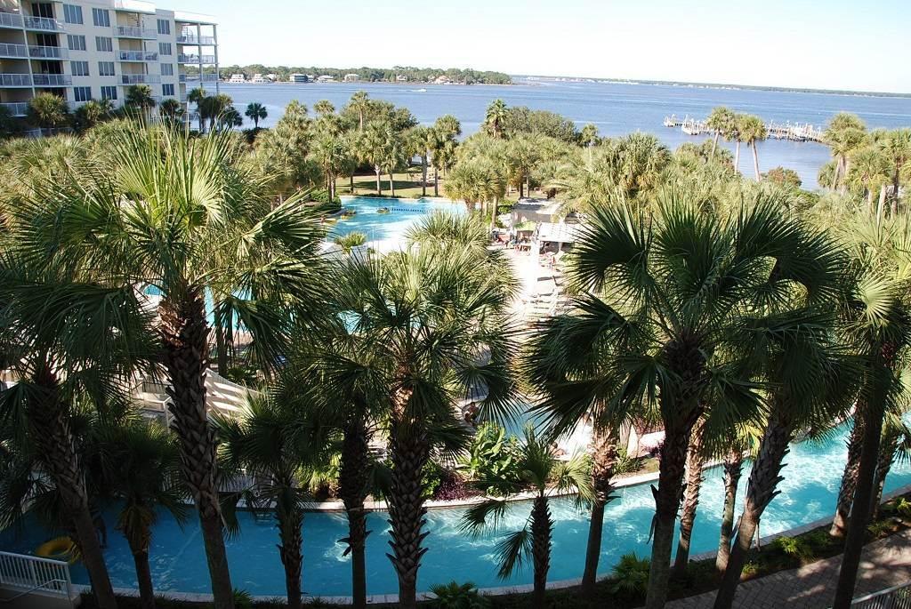 This unit in this magnificent complex offers a direct and unobstructed views of the bay, the Lazy River, large heated pool, two spas, and lush landscaping. An elevated walkover allows you to have Gulf beach access only a few feet from your condo. Rental income in 2016 was $30,000, YTD $24,000!!!