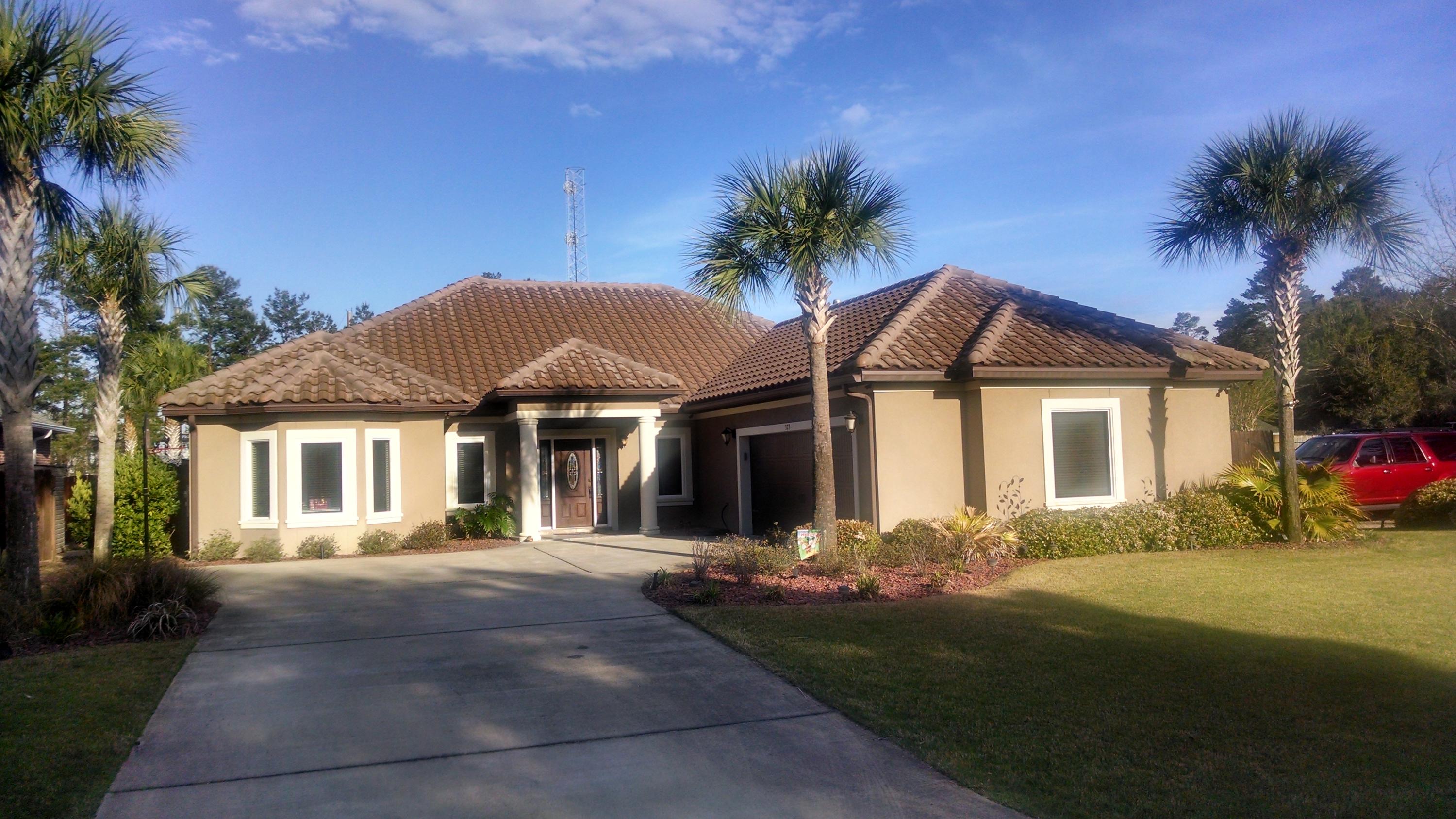 Absolutely beautiful! This immaculate home in Bluewater Bay was built in 2013, features trey ceilings, crown molding and custom tile throughout. The Chef's Kitchen boasts plenty of custom dark wood cabinets for storage plus pantry, granite countertops, stainless steel appliances, and breakfast bar. The First Floor Master Suite boasts trey ceilings, His & her Walk-in Closets, His & Her vanities separate the Garden Tub and Granite shower, and a private water closet. Even the jack and Jill bedroom features a bath with a double vanity. A great backyard and close-by community pool make this house worth a look.