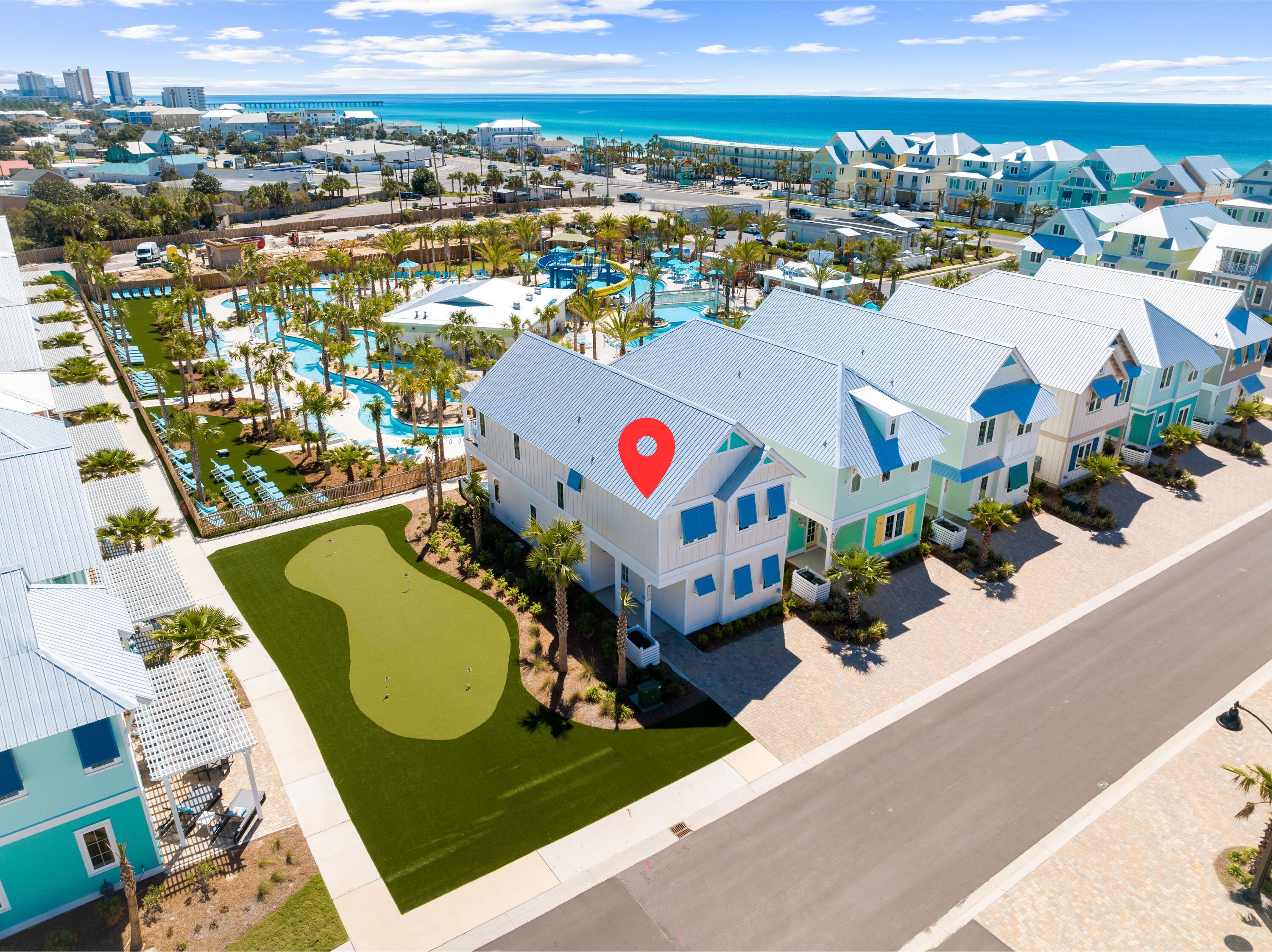 Are you ready to enjoy paradise? This brand new home is located in the hottest development in all of North Florida - Margaritaville Beach Cottage Resort! The home features 5 bedrooms and 4.5 baths on two floors of living space. This beautiful coastal Caribbean home is centrally located within the resort with lush landscaping and just steps from the resort amenities. The moment you walk through the front door you will feel like you are in paradise. The well-appointed home has a upscale, soft, coastal vibe accented by pops of fun color and art that let you know you are in Margaritaville. The open concept first floor has a chef's kitchen with huge island, quartz countertops, soft close maple cabinets, and stainless Frigidaire appliances including a six-burner gas cooktop. The first floor... also features one of two primary bedrooms with a king size bed and ensuite bath. Upstairs you'll find the second primary bedroom with a king size bed and ensuite bath, a queen bedroom with an ensuite bath and two additional queen bedrooms with a large, shared bath. The first floor patio features a dining table and the second level balcony features generous seating and partial gulf views. There is room for three vehicles to park on the paver driveway. This floorplan is perfect for families to enjoy. Margaritaville Beach Cottage Resort offers owners and their guests a true resort with fantastic amenities and services. It will be hard to decide what to do first - float along the 425 foot long lazy river, try out the water slides, relax in the huge oasis pool, or enjoy a cheeseburger and margarita at the poolside bar and grill. And let's not forget you can also enjoy 580 feet of dedicated beachfront offering a full suite of beach services, sparkling emerald green waters and soft sandy beaches! In 2025 you will also be able to enjoy the full service restaurant, fitness center, arcade and more! Margaritaville Beach Cottage Resort is a short-term rental community with every amenity a guest would love to enjoy while on vacation. HOA total in the listing includes the HOA which is $1775.00/qtr for HOA and $450/qtr for Club dues. A one-time capital contribution of $1,220 is due at closing and a Club Membership deposit of $5000 is required, but the buyer will get back 80% down the road when they sell and close.