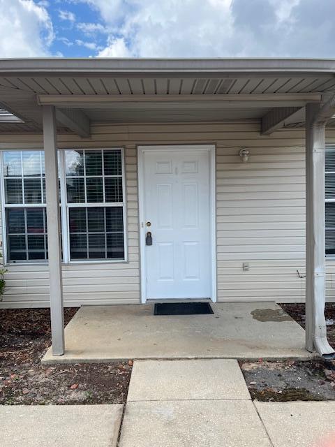 2 bedroom, 1 bath unit. All tile/laminate. Laundry area inside unit. Lawn care provided by owner. No pets allowed and no smoking inside the unit.