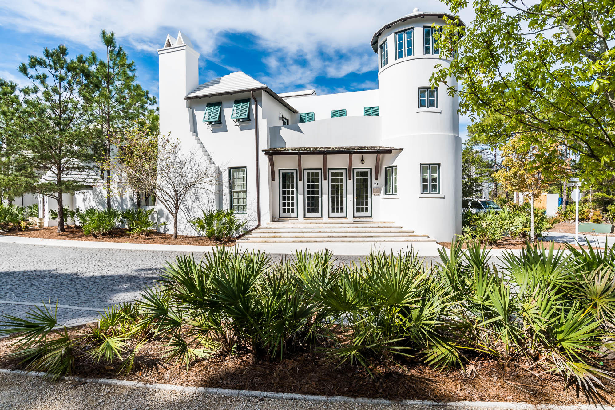 Villa Le Blanc is a beautiful and spacious 5-bedroom, 5.5-bath villa in the gorgeous community of Alys Beach. Surrounded on two sides by pristine parkland, the home is located across the street from the breathtaking Caliza Pool and Restaurant and is an easy walk to The Gulf Green beach access. The kitchen has an open floor plan and featuring Wolf & Sub-Zero appliances. The bright and open living room is aligned with a gas fireplace. Just steps away, through large French doors, is the beautiful private courtyard complete with dining banquette, sparkling pool and fountain, and plenty of outdoor seating for lounging and relaxing. The first floor also features a one-bedroom suite with private bath, bright entry gallery and a cozy reading nook. On the second floor, the master bedroom features a gorgeous shellstone bath complete with soaking tub and double vanity and a terrace that overlooks the private pool, with views of Central Park and Caliza Pool. Also, upstairs is a guest bedroom with a private bath and a bunk room with a private bath. A large detached guest suite features a sitting area, fire place, full bathroom with soaking tub, and a wet bar.